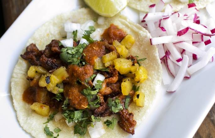 Order Al Pastor Tacos. food online from Gringos & Mariachis store, Bethesda on bringmethat.com