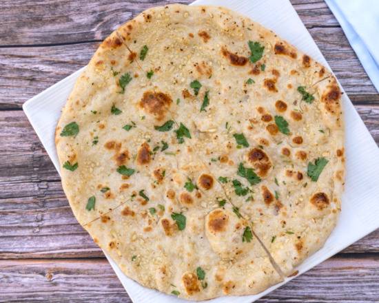 Order Garlic Naan food online from Everest Kitchen store, Albany on bringmethat.com