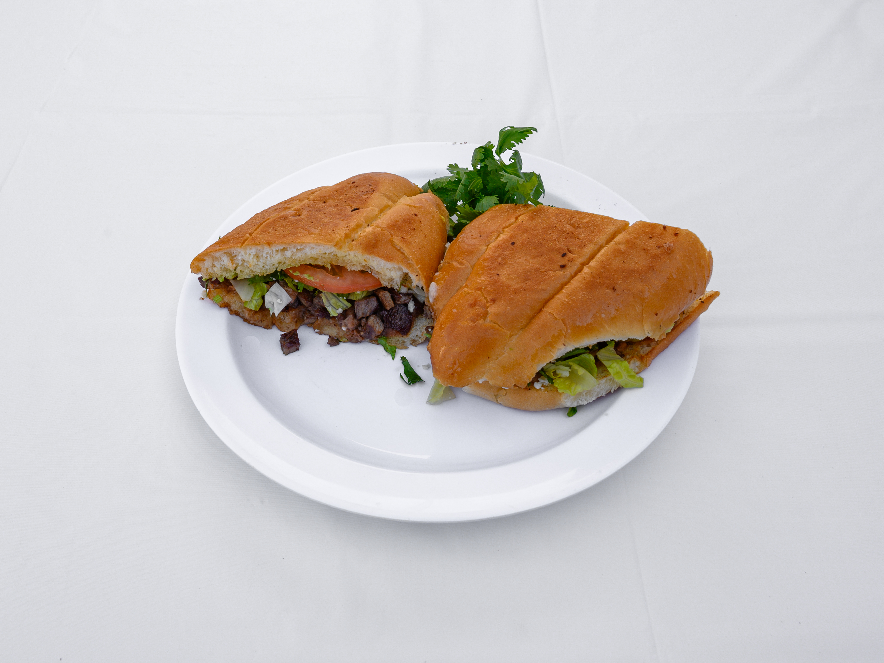 Order Tortas food online from North Palm Canyon Deli store, Palm Springs on bringmethat.com