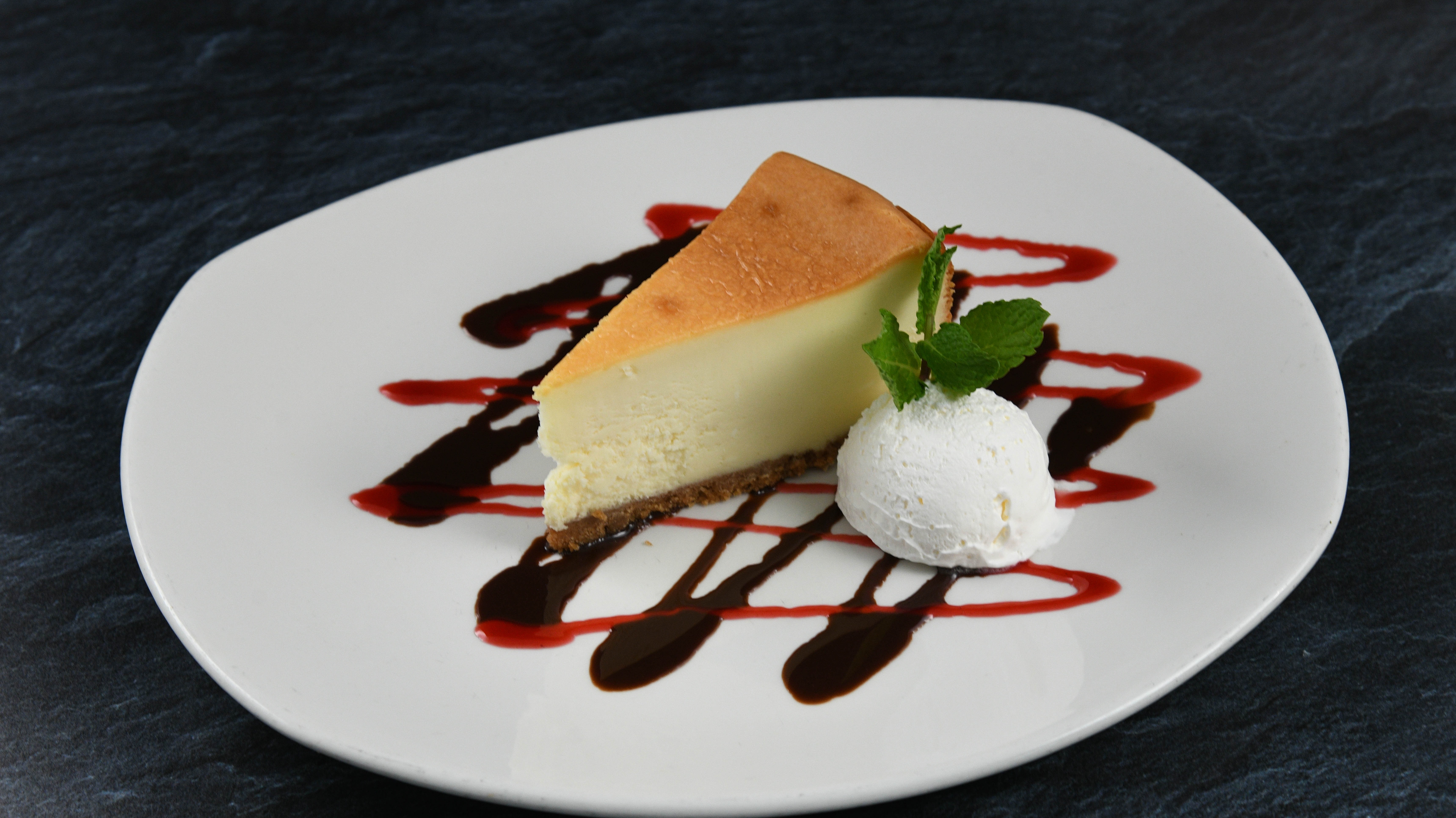Order Cheesecake food online from Rainforest Cafe store, Atlantic City on bringmethat.com