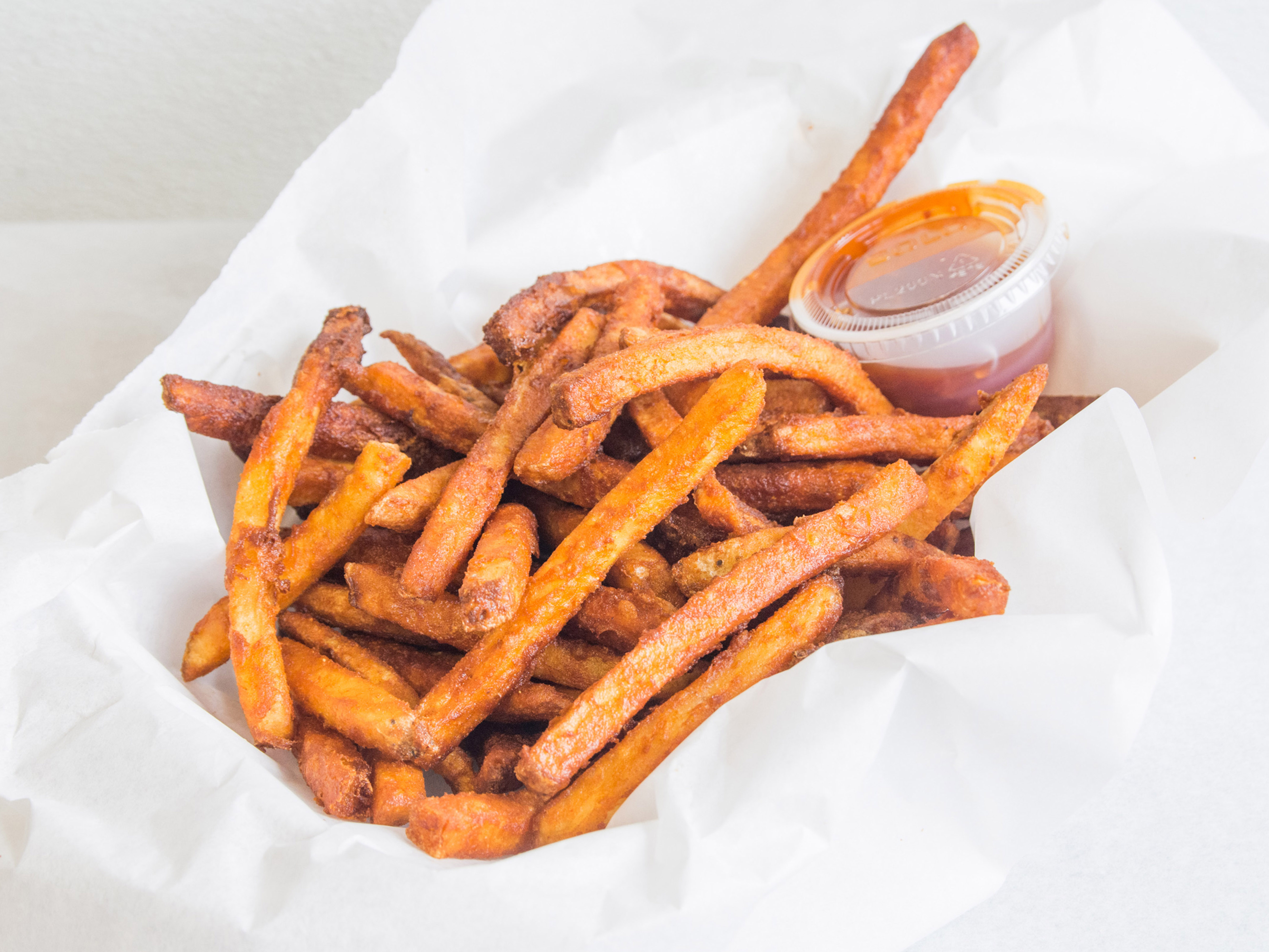 Order Seasoned Fries food online from Sporty Dog Creations store, Baltimore on bringmethat.com