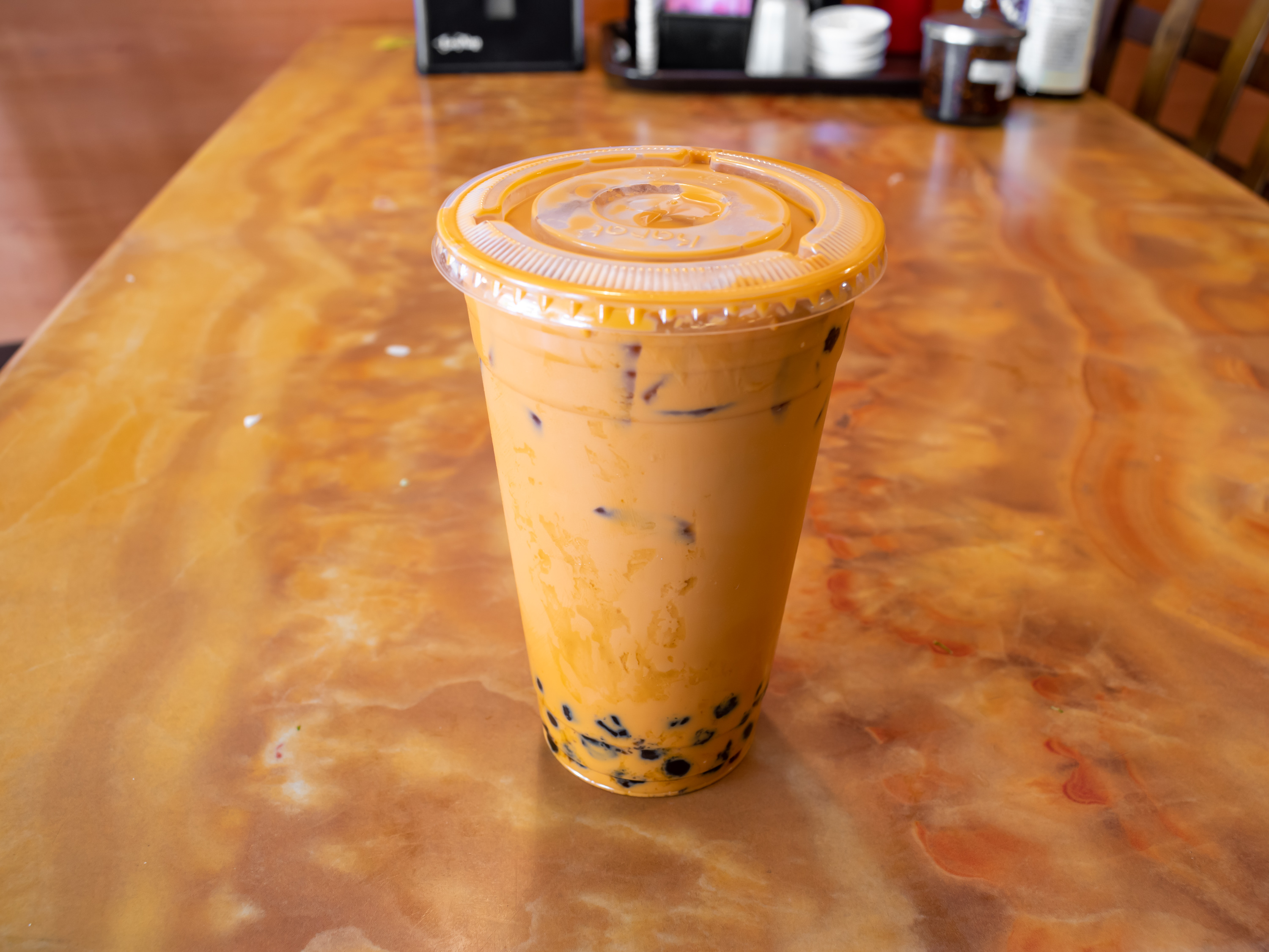 Order Thai Tea- Tra Thai food online from Pho Of The Desert store, Indio on bringmethat.com