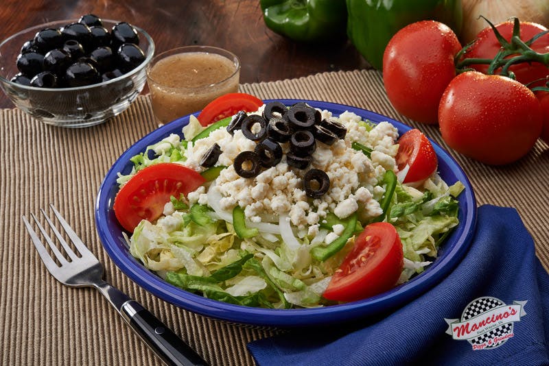 Order Greek Salad - Small food online from Mancino Pizza & Grinders store, Fort Wayne on bringmethat.com