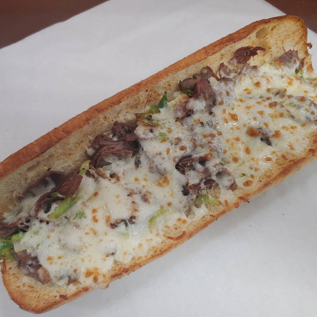 Order Philly Cheesesteak Sandwich - 12" food online from Marcello's Pizza and Pasta store, Riverside on bringmethat.com
