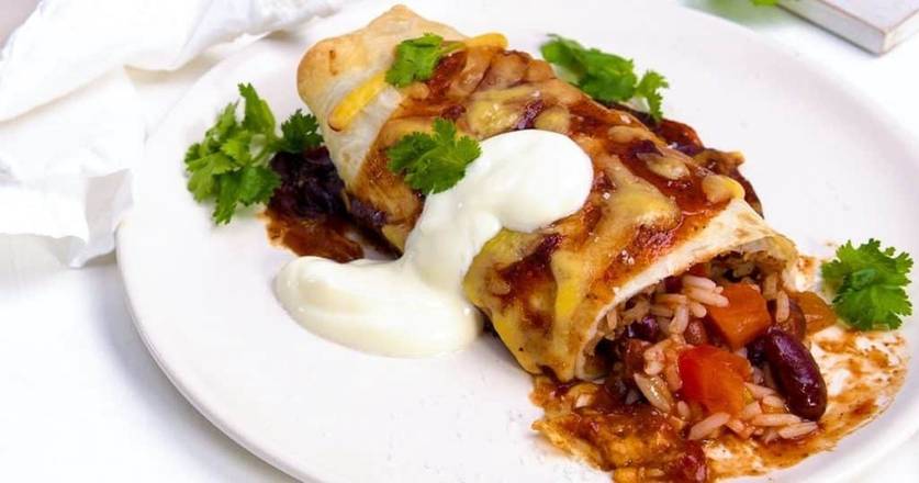 Order Frijoles Y Queso Enchilada food online from Oaxaca Taqueria Columbia store, New York on bringmethat.com