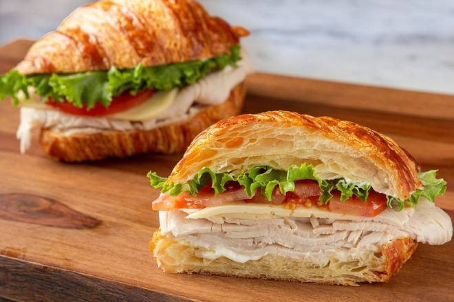 Order Turkey and Cheese Croissant Sandwich  food online from Porto Bakery & Cafe store, Buena Park on bringmethat.com
