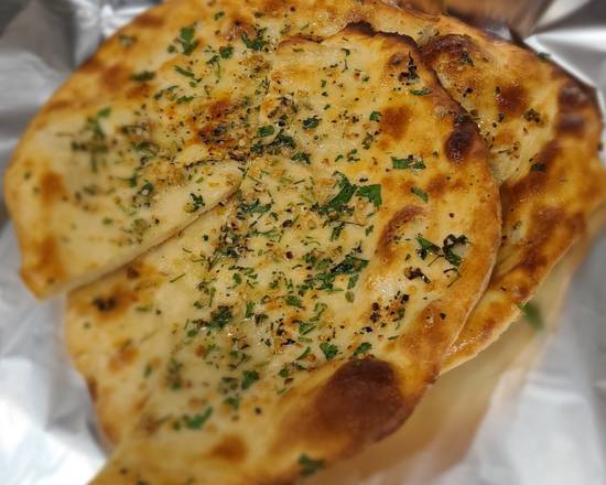 Order Garlic Naan food online from Flavours Of India store, Gresham on bringmethat.com