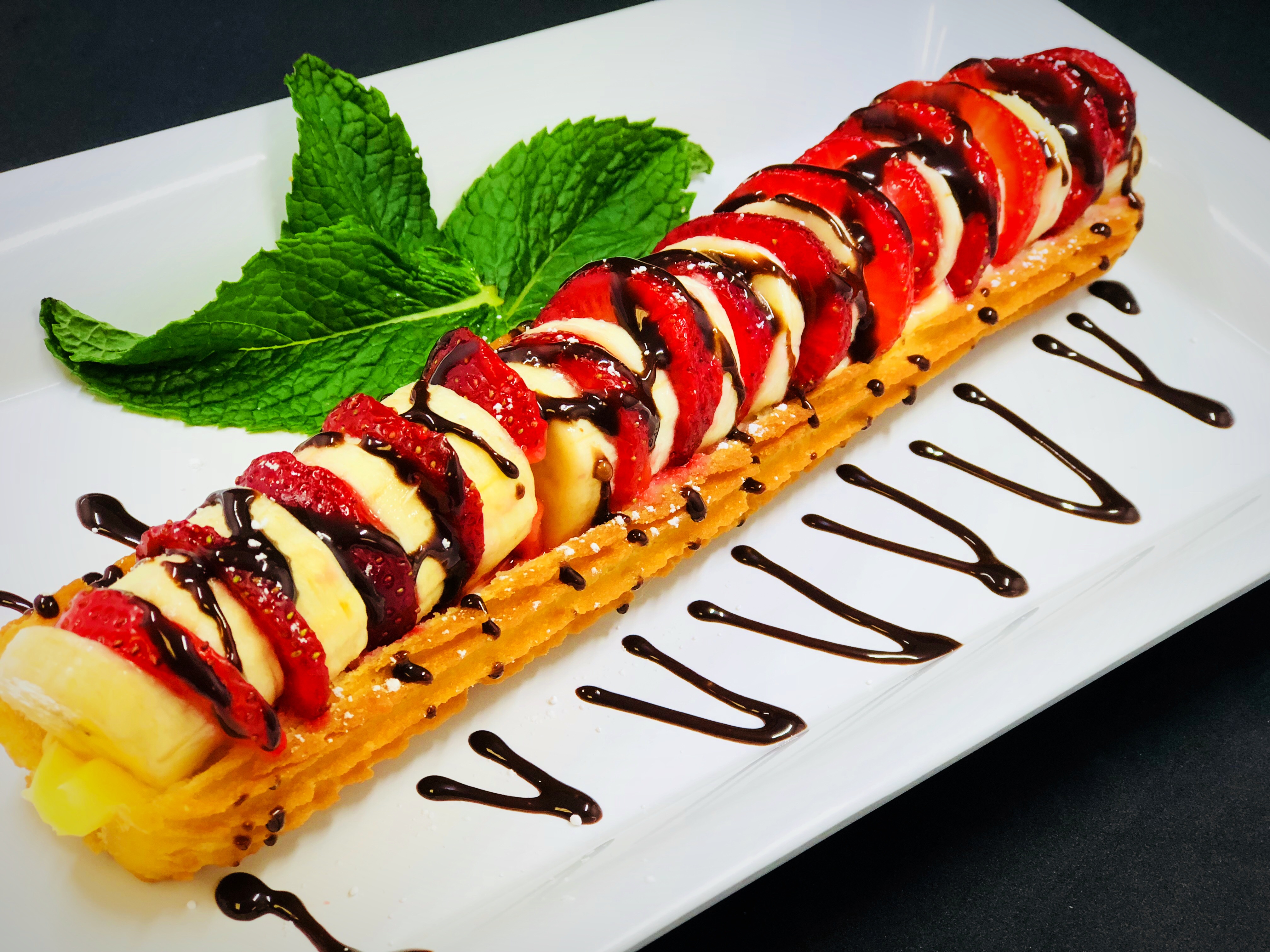 Order Strawberry and Banana Churros food online from Churros Y Chocolate store, Algonquin on bringmethat.com