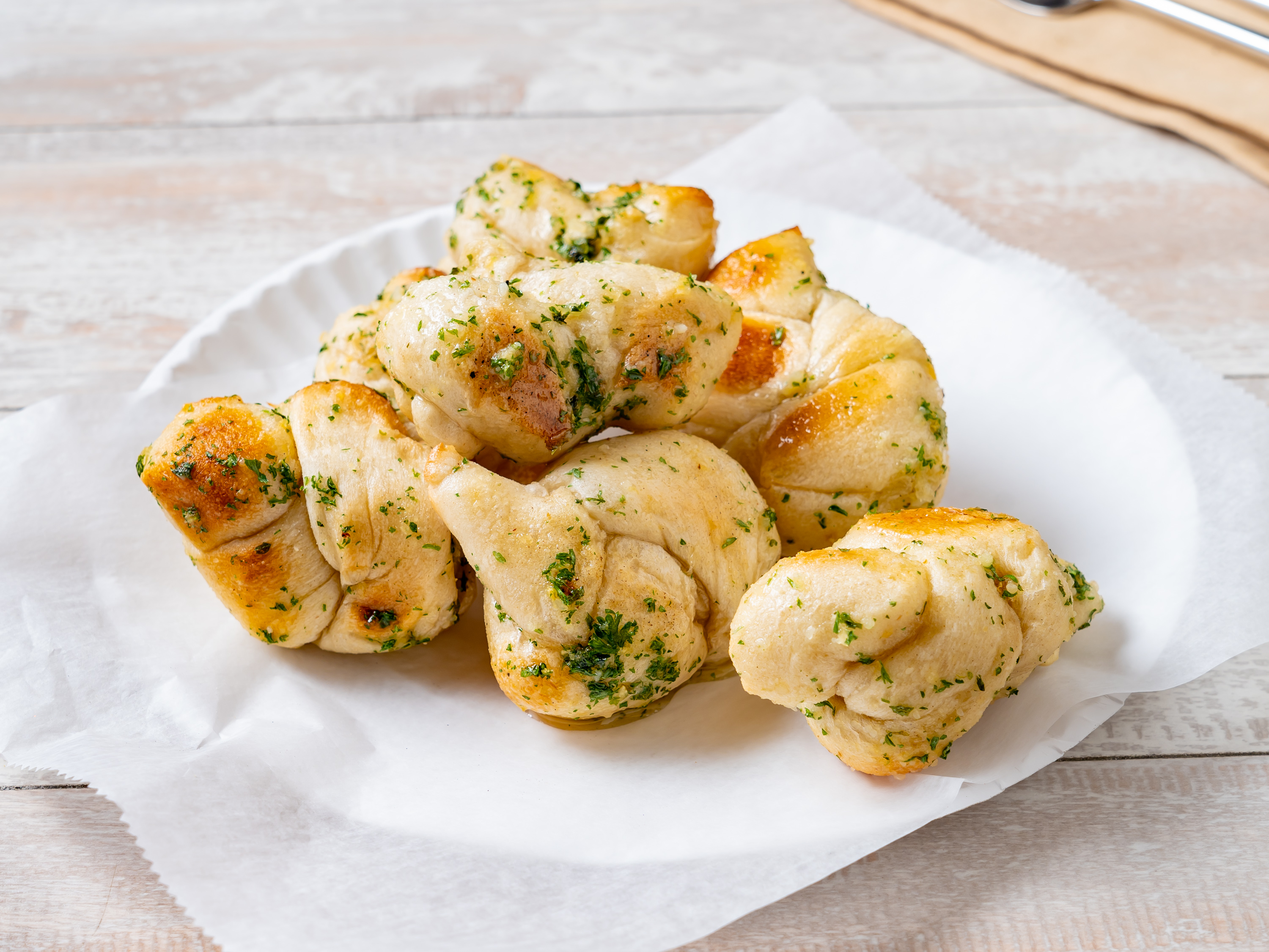 Order 6 Piece Garlic Knots food online from Cousins Pizzeria store, Bronx on bringmethat.com