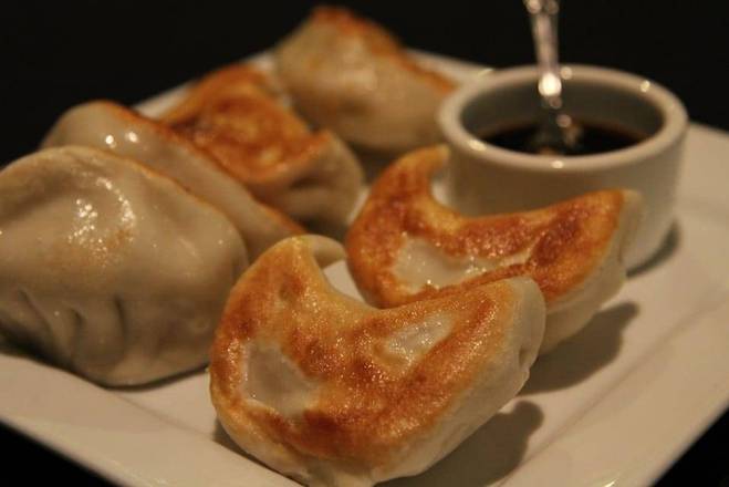 Order A4. Pot Stickers 锅贴 food online from Jade Restaurant & Lounge store, Seattle on bringmethat.com