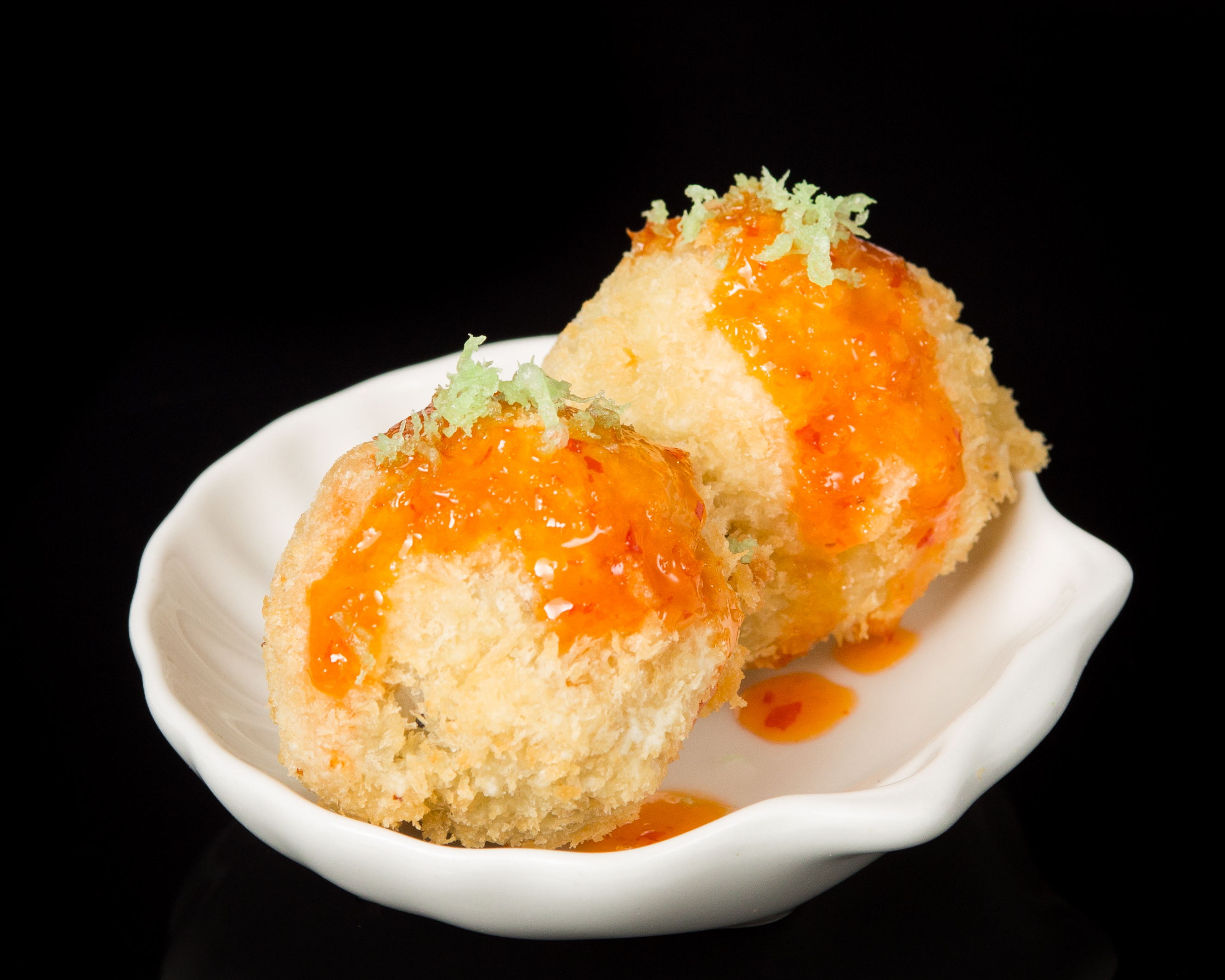 Order 2 Piece Fried Fish Ball food online from Sushi Sakura Express store, Houston on bringmethat.com