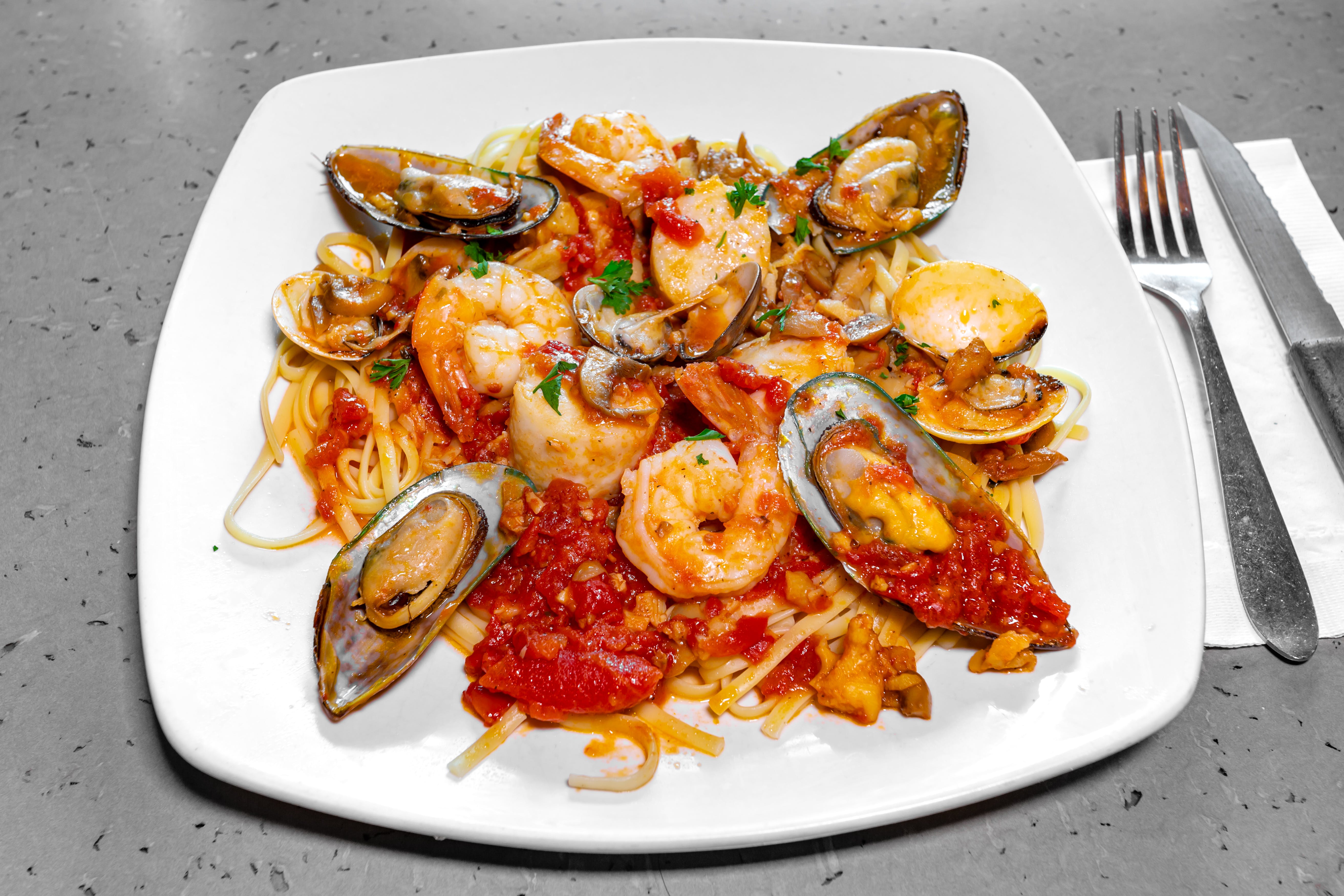 Order Seafood Marinara - Entree food online from Nino Italian Restaurant store, Reading on bringmethat.com