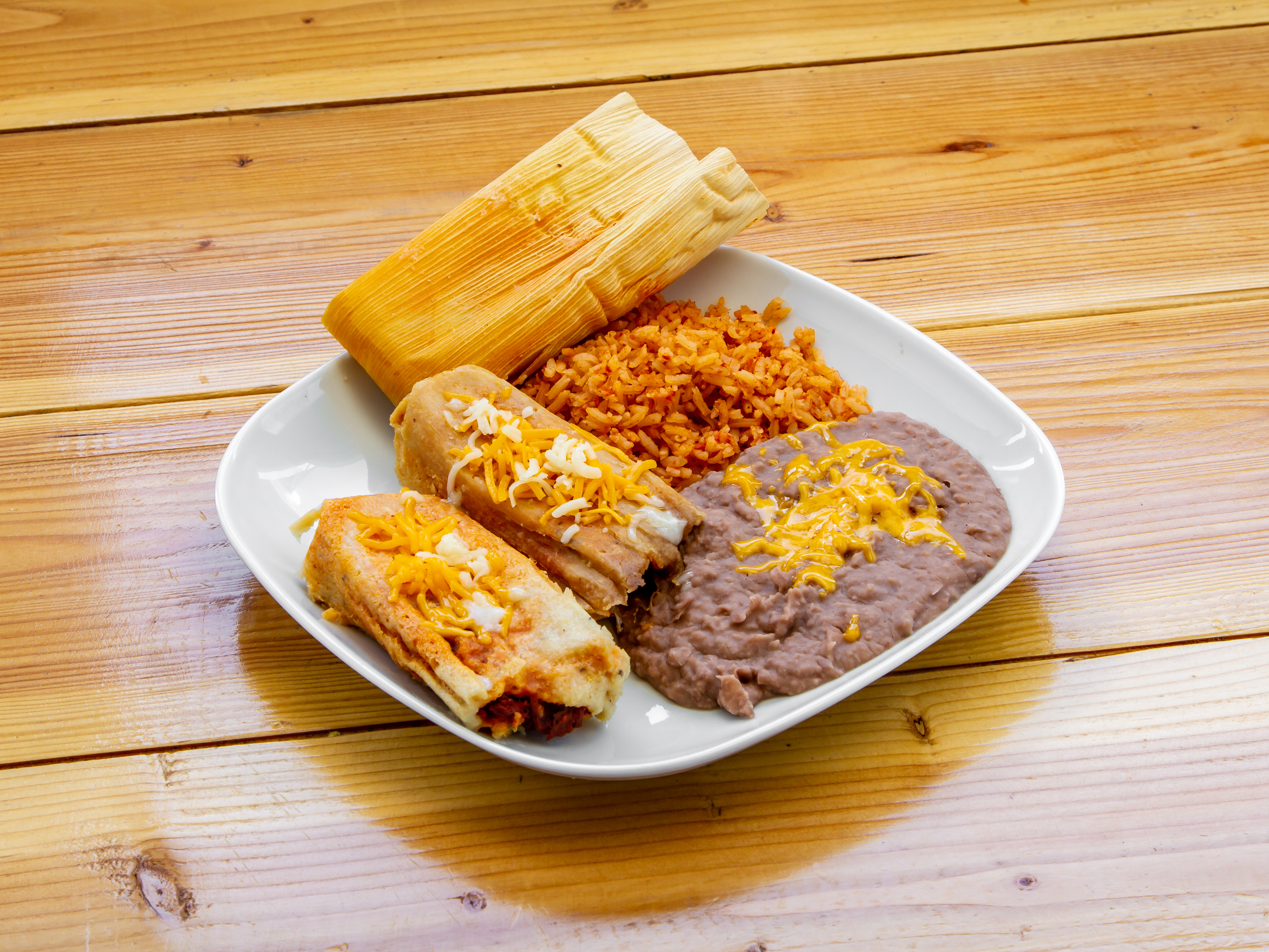 Order 8. Tamales Combo food online from Viva Burrito store, Tucson on bringmethat.com