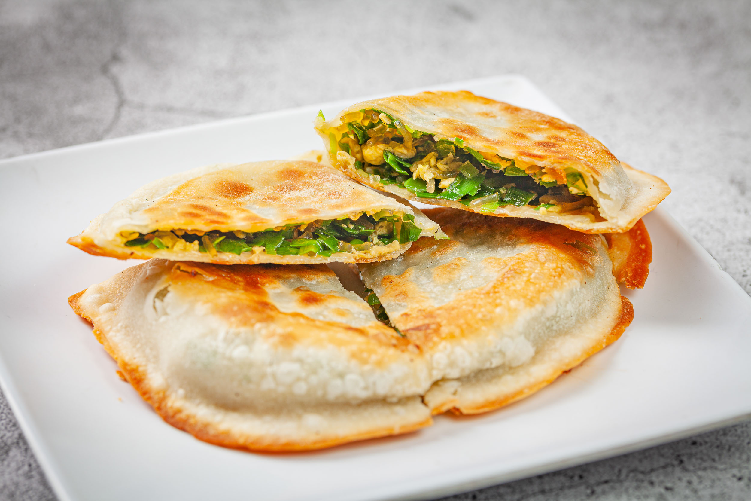 Order Frozen Tianjin Style Chive & Egg Pancake food online from Mama's Dough store, Kent on bringmethat.com