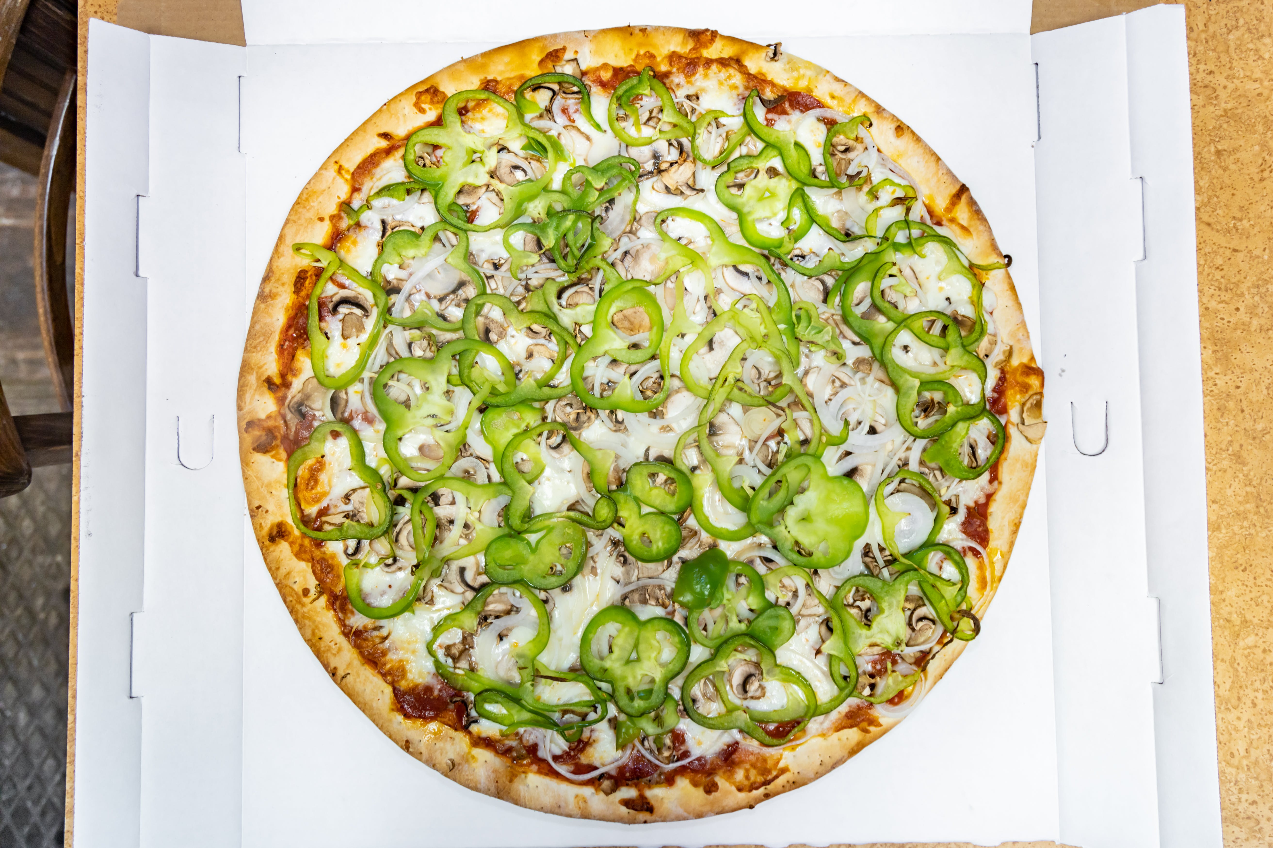 Order Deluxe Pizza - Small 12" (Serves 2-3 People) food online from Mario Pizza store, North Aurora on bringmethat.com