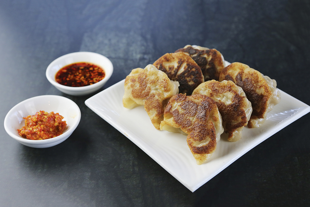 Order A9. 6 Pieces Pork Pot Sticker food online from Guilin Rice Noodle House store, San Francisco on bringmethat.com