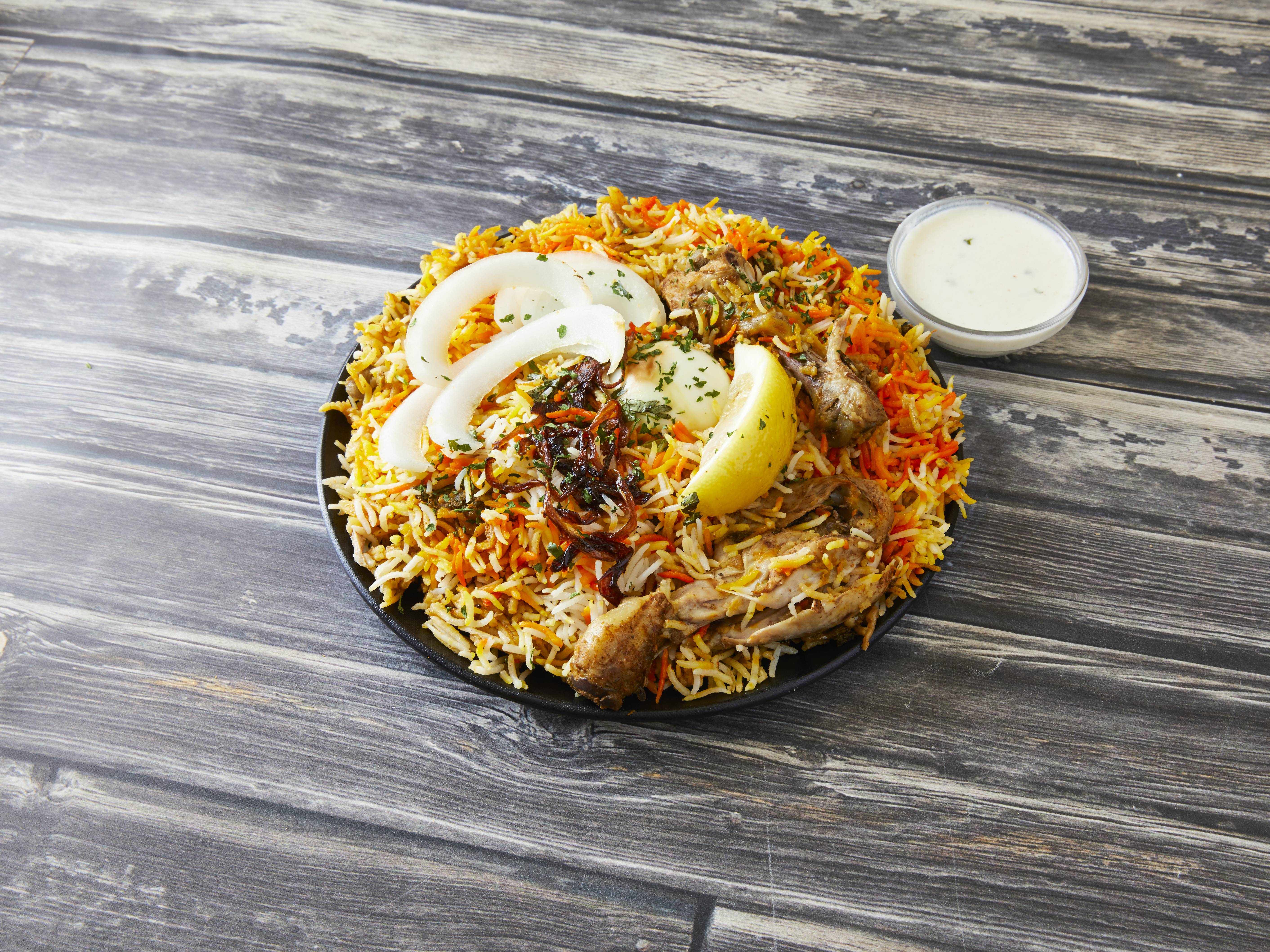 Order Hyderabadi Chicken Biryani with Bone food online from Indian Cuisine store, Portage on bringmethat.com