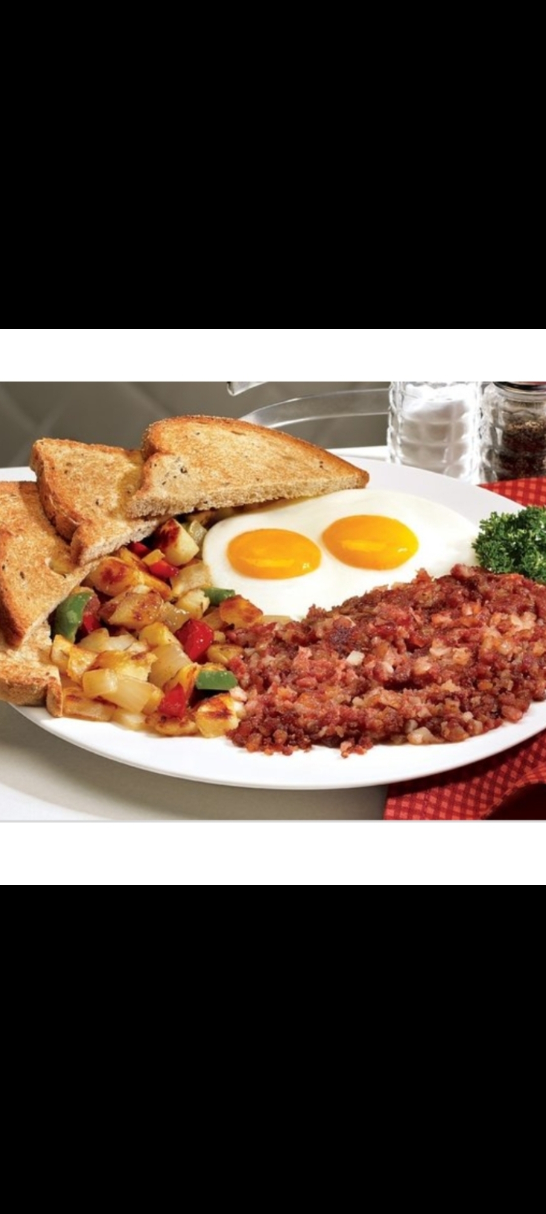 Order Corned Beef Hash And Eggs Platter (eggs corned beef hash your choice of hash browns or home fries and toast) food online from American Gourmet Foods Deli store, New York on bringmethat.com