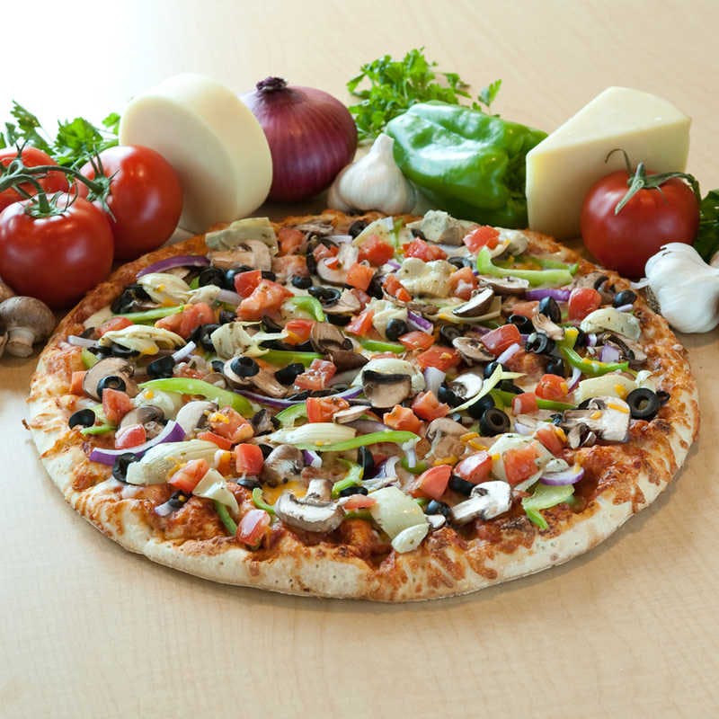 Order Classic Veggie Pizza - Individual food online from Straw Hat Pizza store, Clovis on bringmethat.com