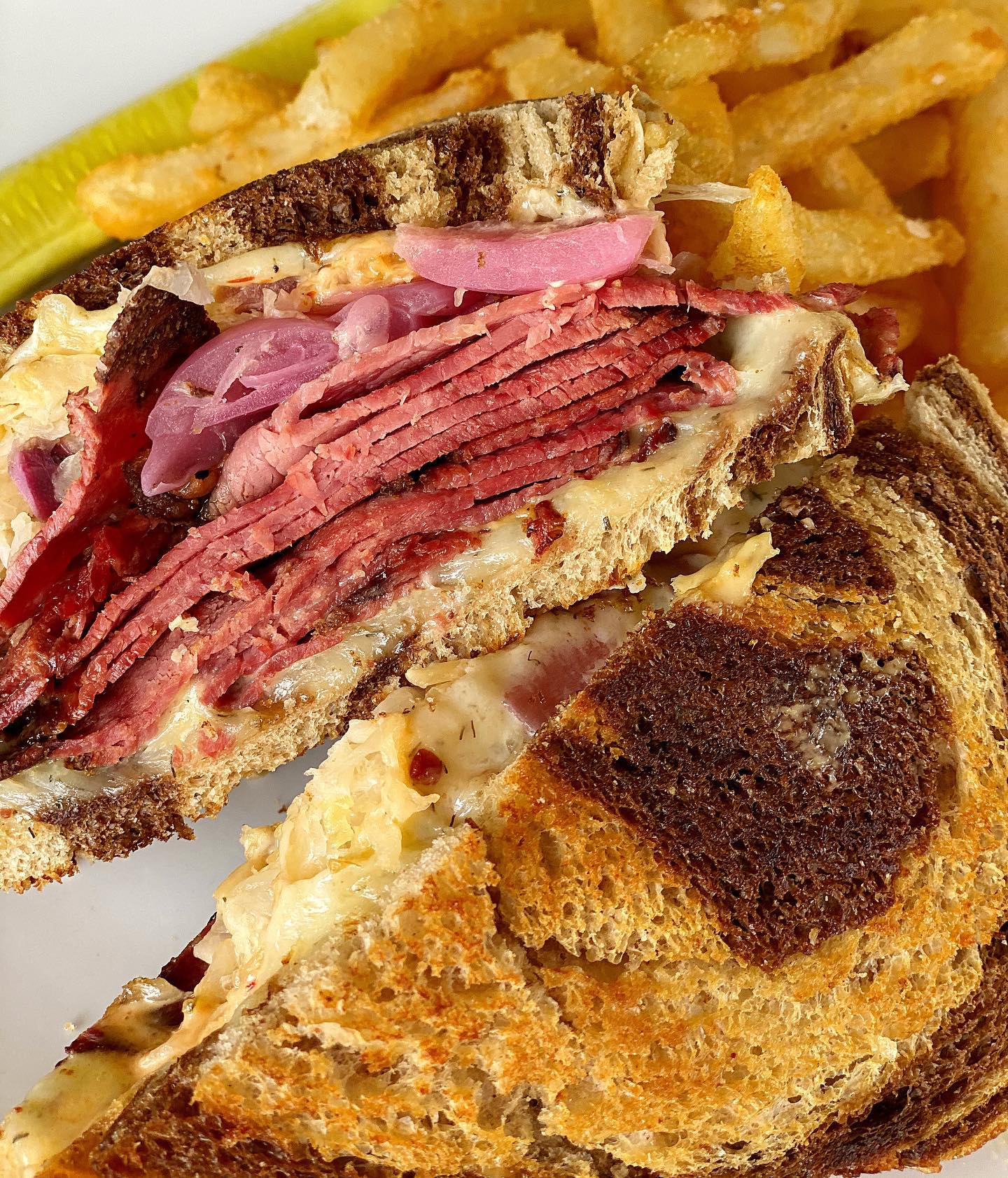 Order Pastrami Reuben Sandwich food online from Grill & Tap Room at Shadow Lake store, Penfield on bringmethat.com