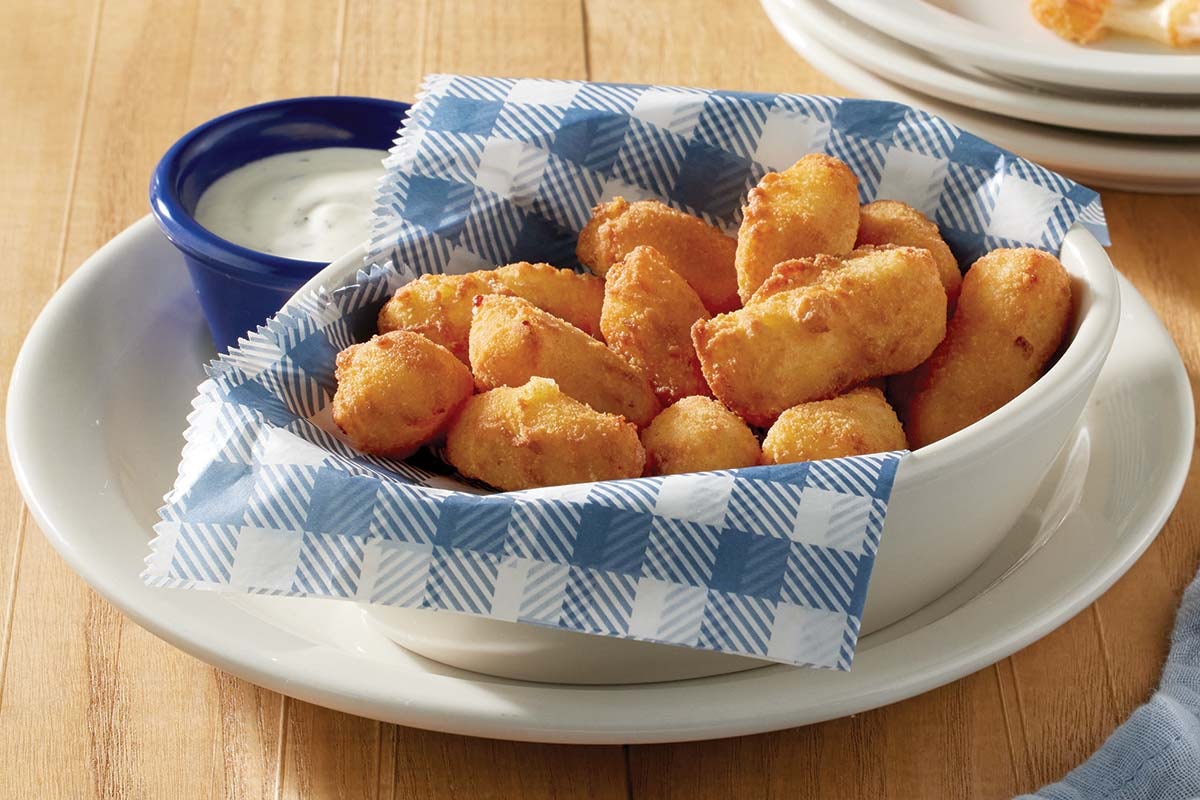 Order White Cheddar Cheese Bites food online from Cracker Barrel Old Country Store store, Adairsville on bringmethat.com