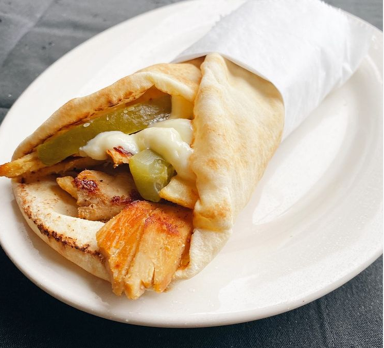 Order 10. Chicken Shawarma Sandwich  food online from Wally's Falafel and Hummus store, Minneapolis on bringmethat.com