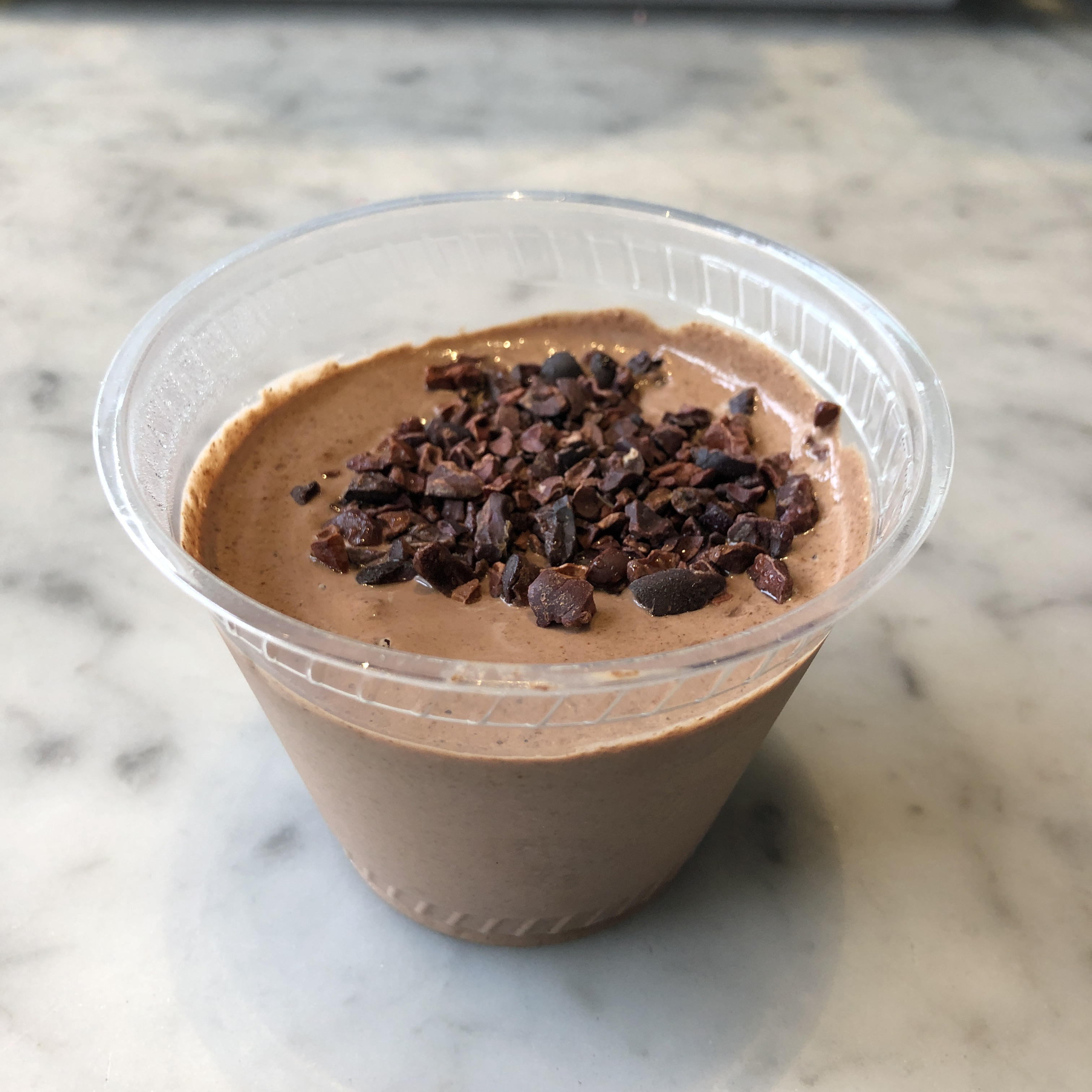 Order Cacao Chia Pudding (GF) food online from Nourish Cafe store, San Francisco on bringmethat.com