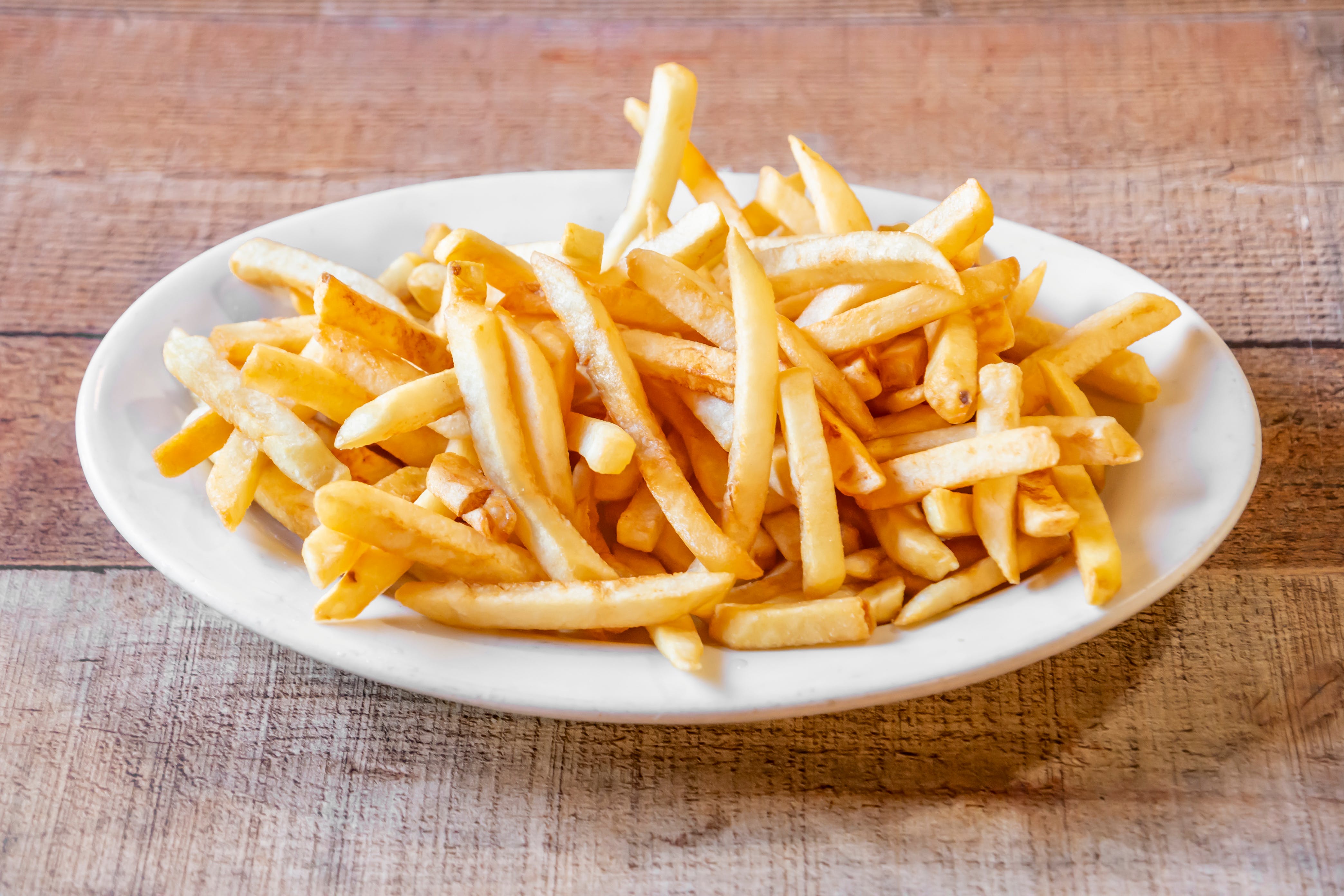 Order French Fries - Side food online from Casanova's Kitchen store, Feastervl Trvs on bringmethat.com