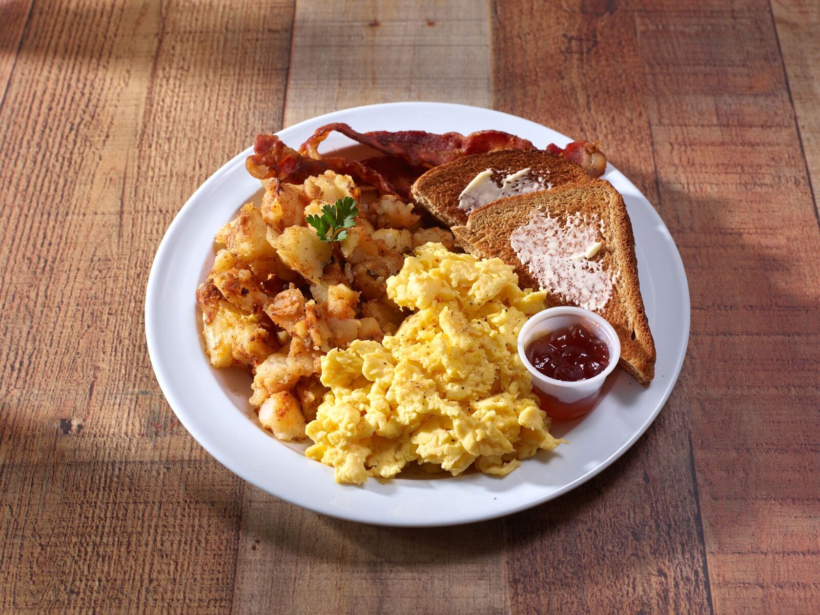 Order 2 Eggs with Toast, Meat and Homefries food online from New York Style Pizza store, Syracuse on bringmethat.com