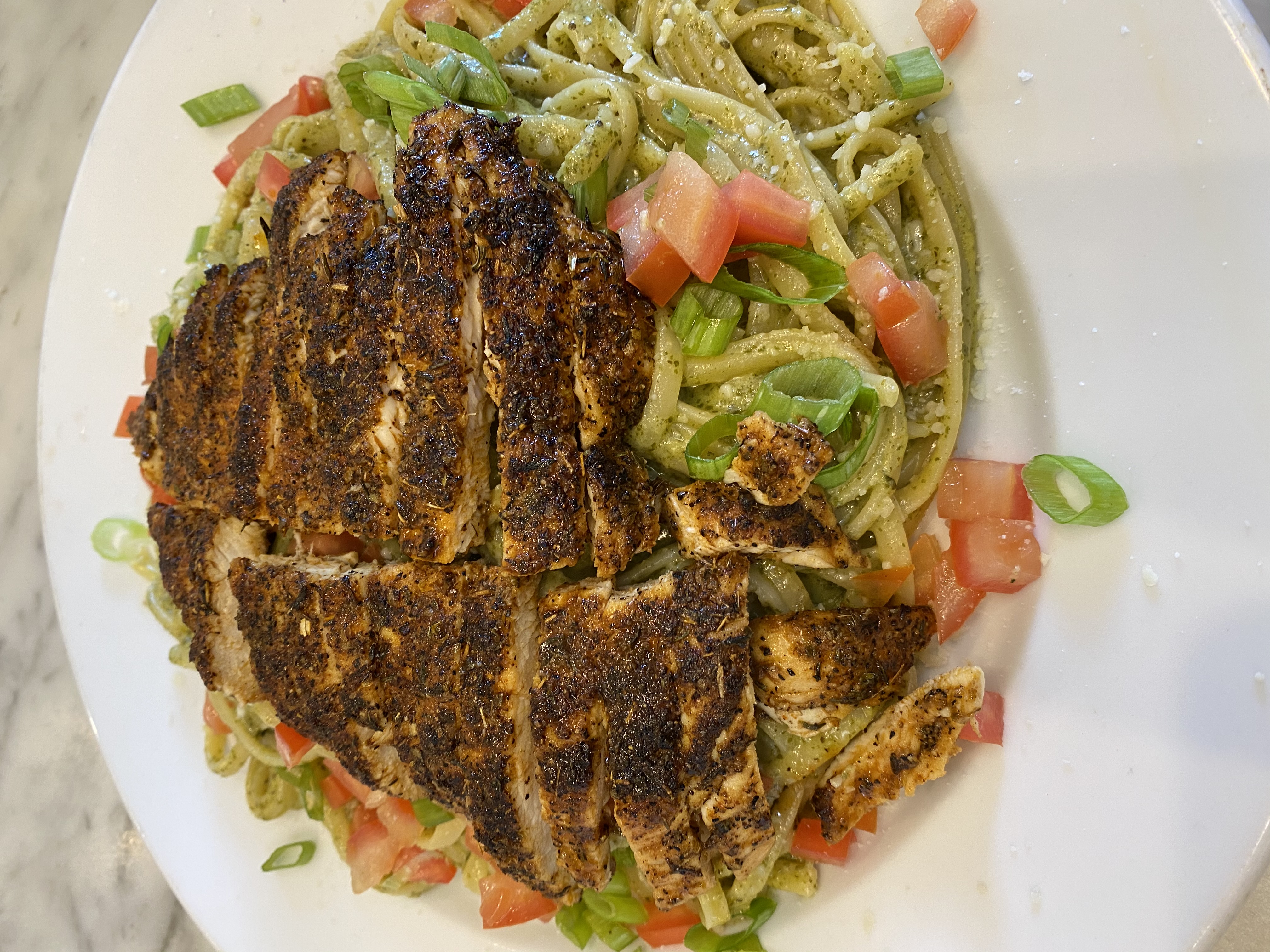 Order Linguine Pesto Pasta with Blackened Chicken  food online from Tonino's Place Pizzeria store, Woodland Hills on bringmethat.com
