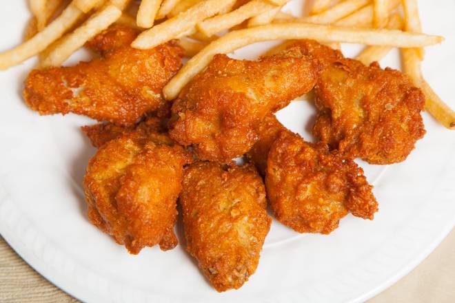 Order 12 pcs Mild wings with Fries & can soda food online from Crown Fried Chicken & Halal Foods store, Wilkes-Barre on bringmethat.com