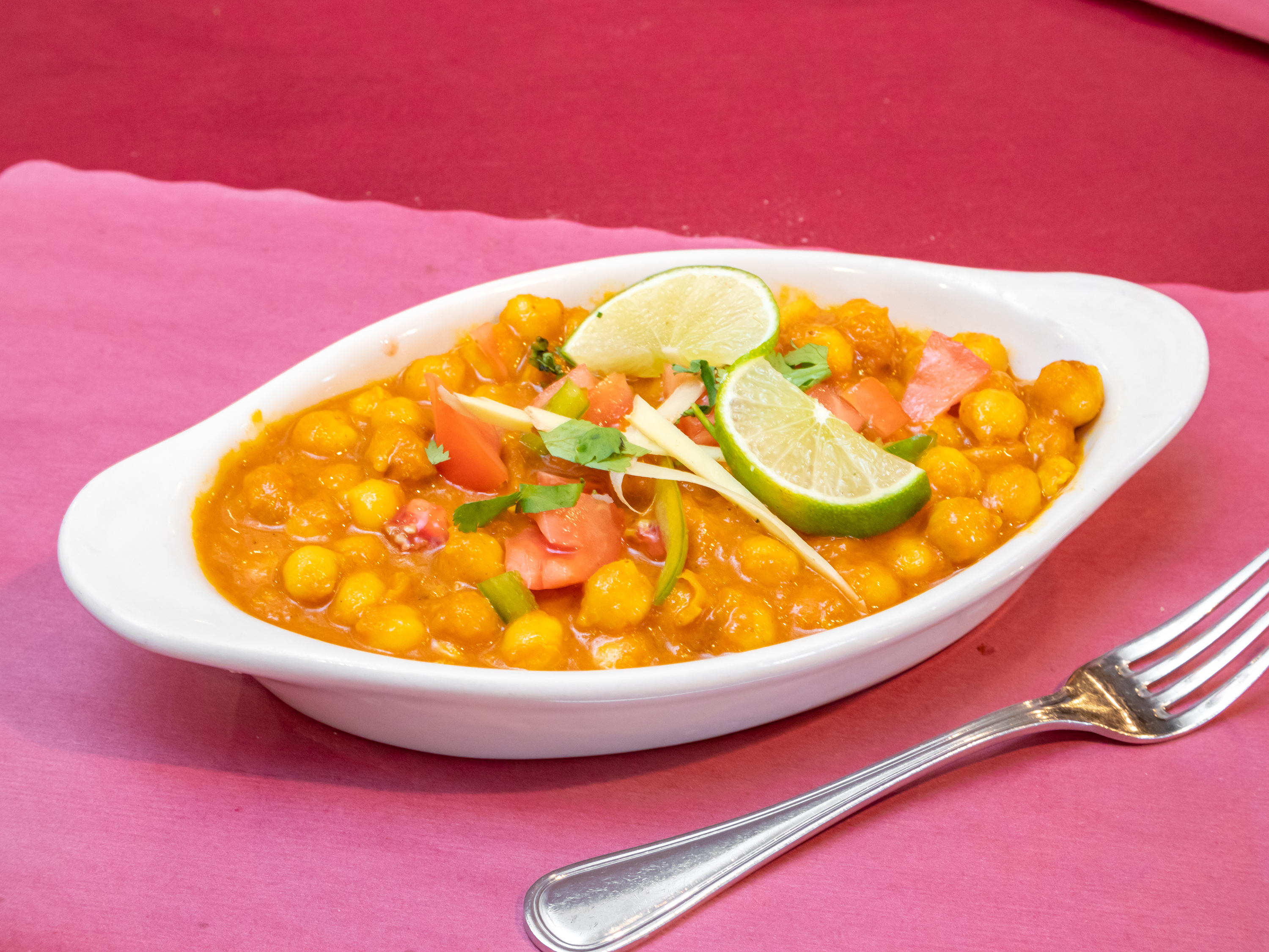 Order Chana Masala food online from Caffe India store, Morristown on bringmethat.com