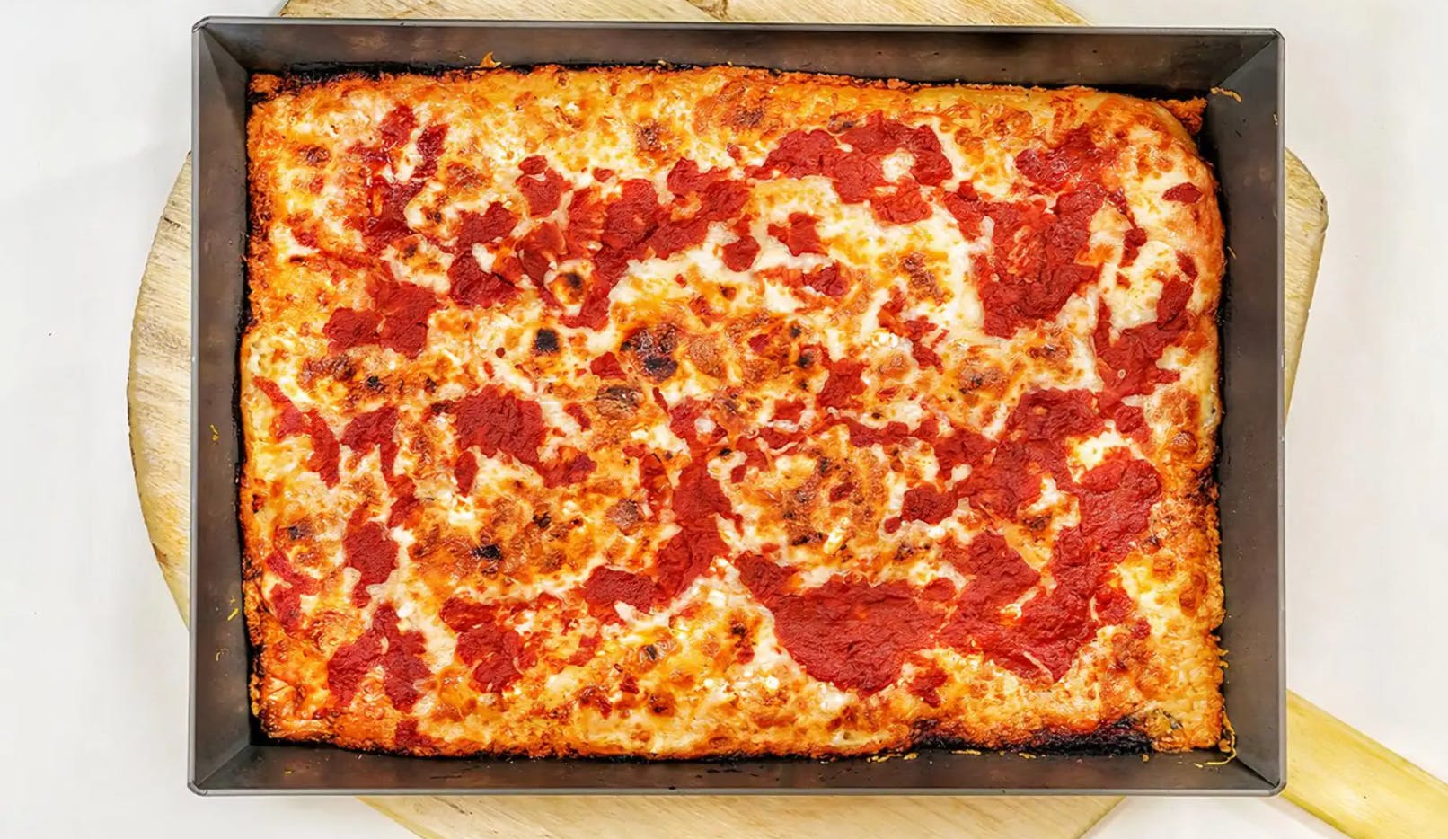 Order Three Cheese Red Top Sicilian Style Pizza - 10''x14'' food online from Breakfast Pizza store, San Francisco on bringmethat.com