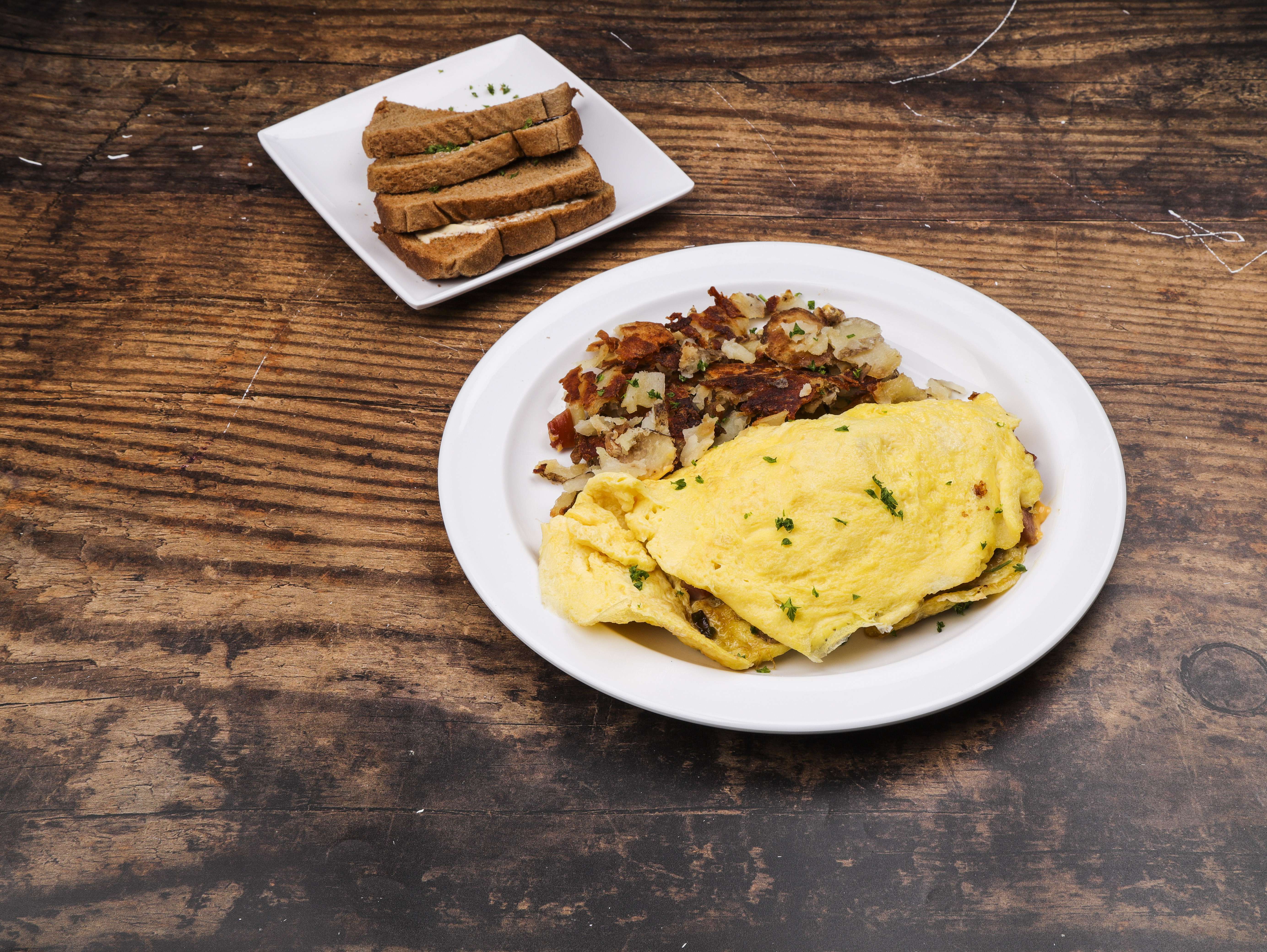 Order Farmers Breakfast Omelette food online from Sam's Diner store, Maumee on bringmethat.com