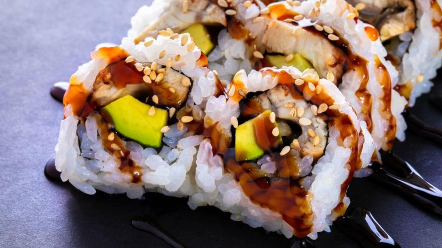 Order (e040) Eel Avocado Roll food online from Sushi Stop store, Los Angeles on bringmethat.com