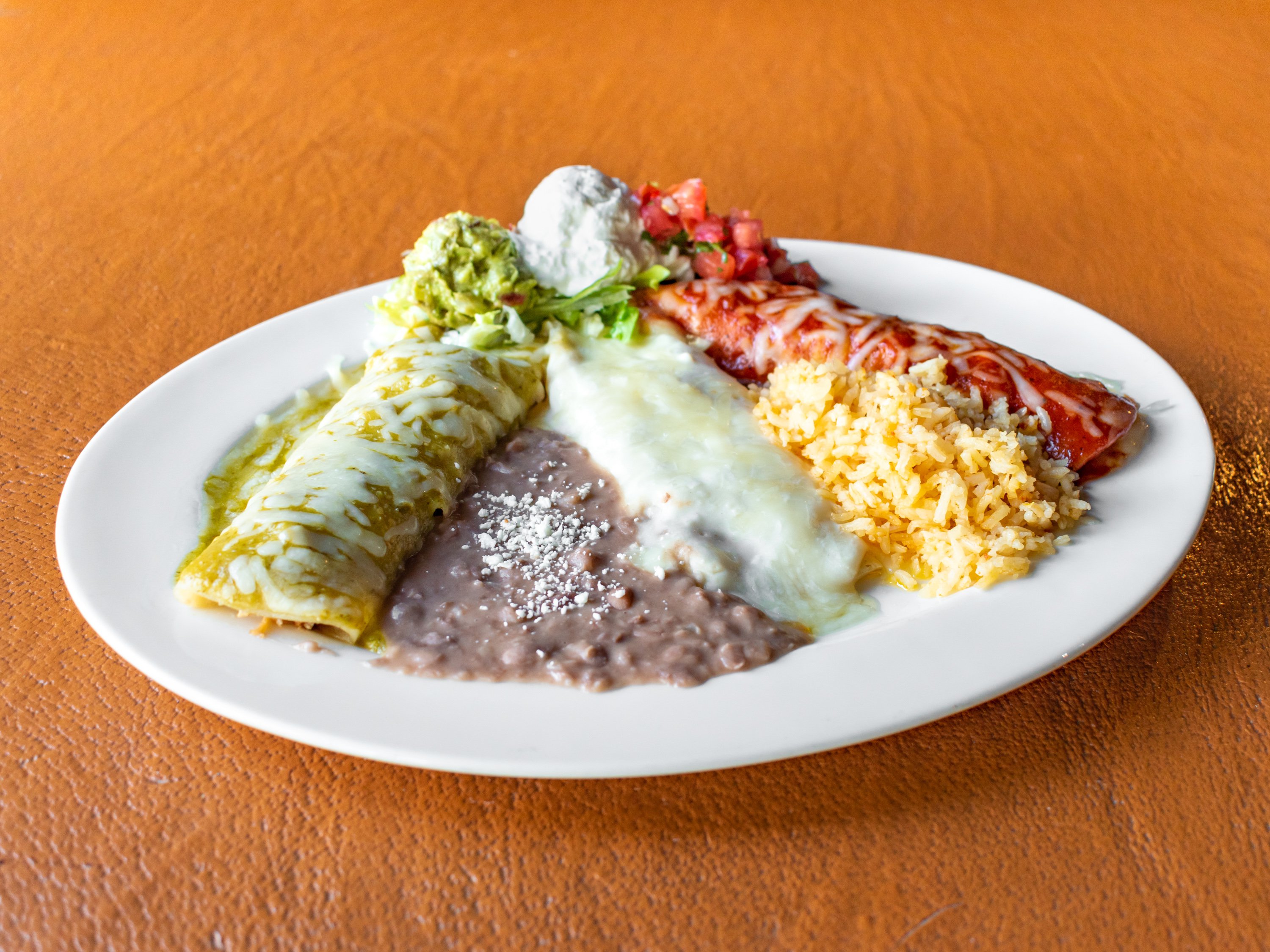 Order Trio Enchiladas food online from Soul of Mexico store, Indio on bringmethat.com