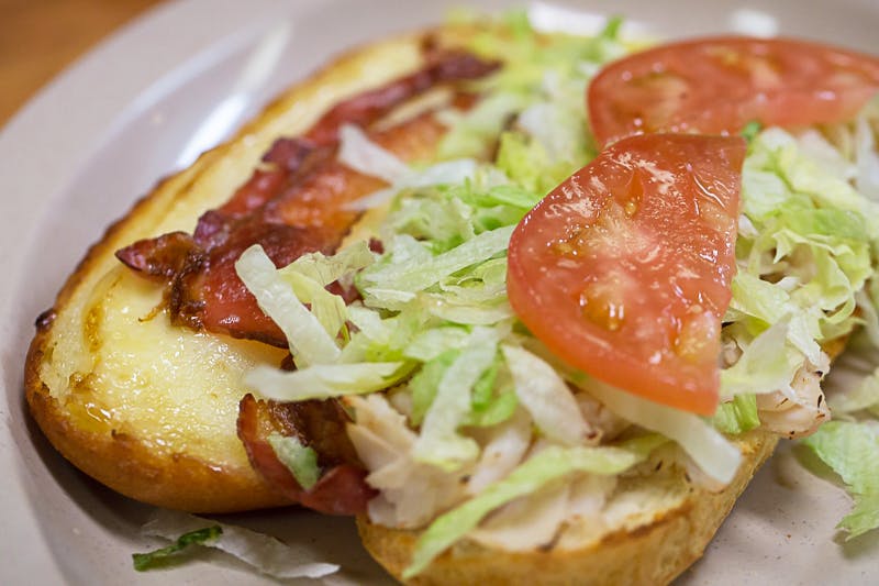 Order Turkey Club Grinder - Half food online from Mancino Pizza & Grinders store, Fort Wayne on bringmethat.com