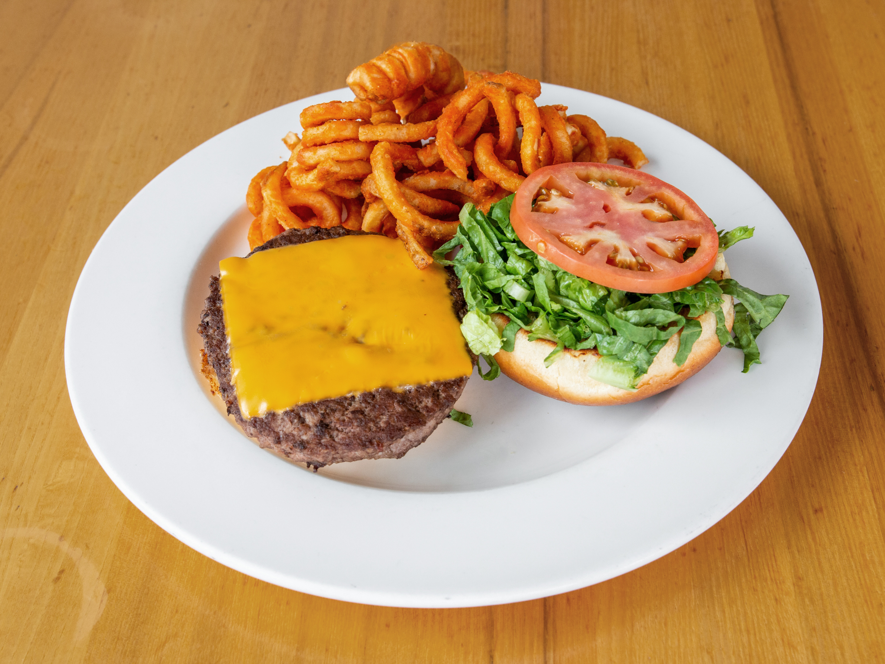 Order All American Cheeseburger food online from Between The Buns store, Downers Grove on bringmethat.com