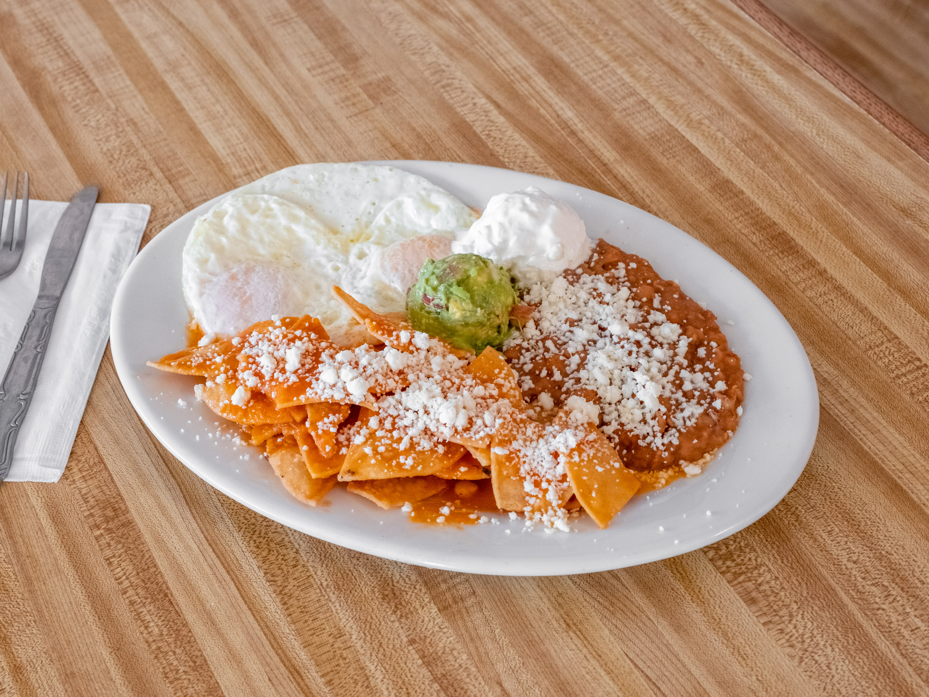 Order Chilaquiles food online from B & C Burgers store, Placentia on bringmethat.com