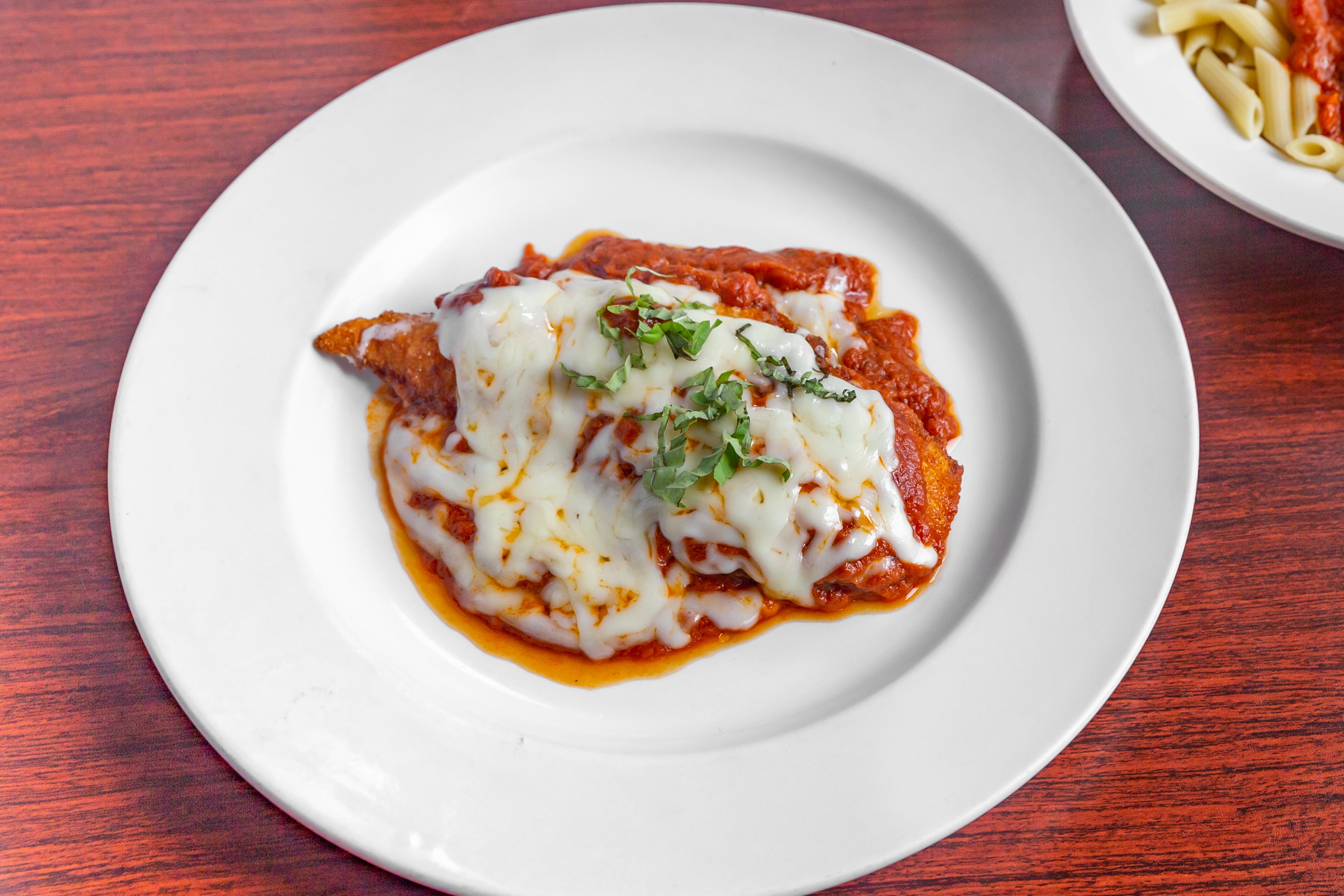 Order Chicken Parmigiana - Entree food online from Frank & John From Italy On The Water store, Greenville on bringmethat.com