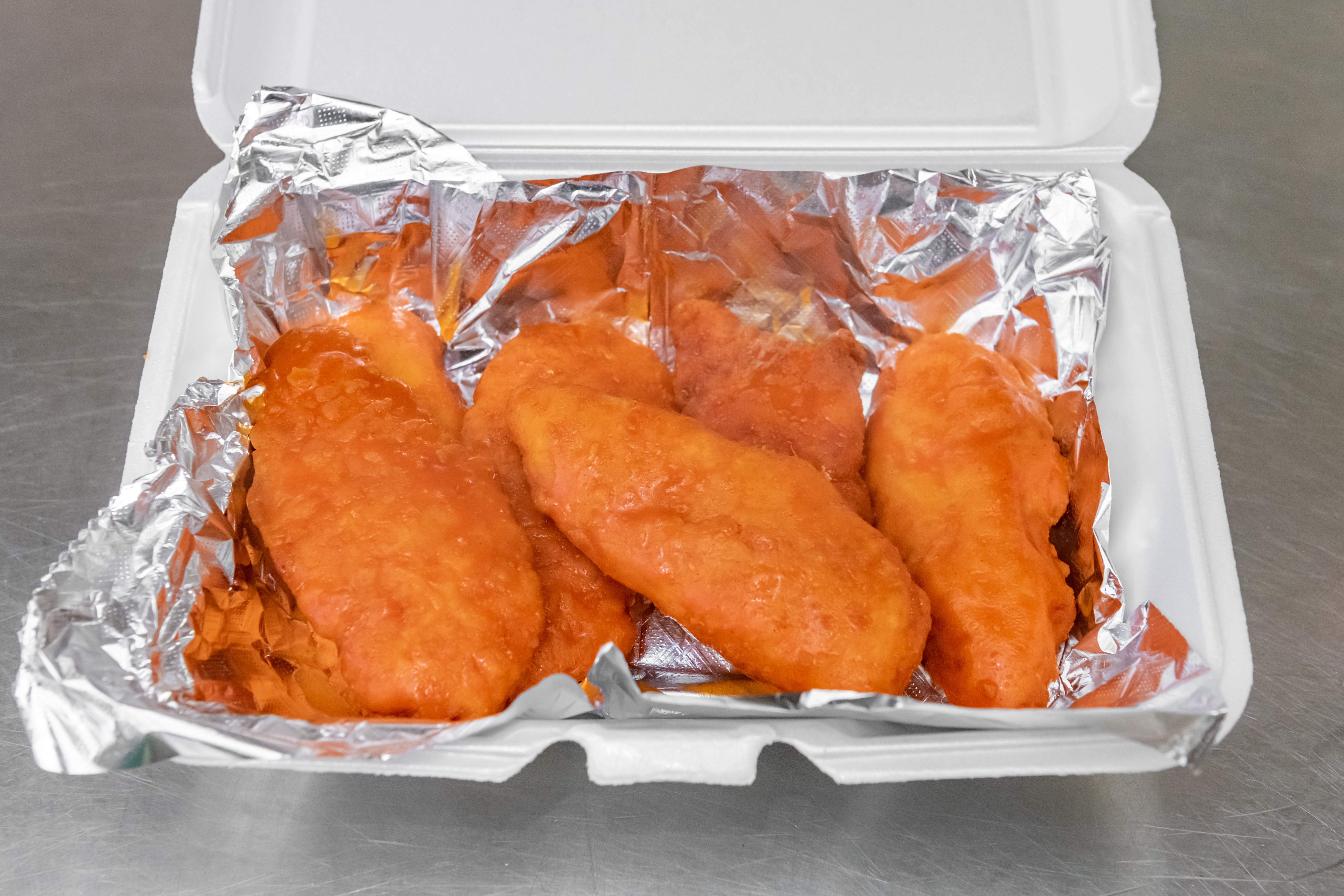 Order Buffalo Chicken Tenders - Appetizer food online from Legends Pizza store, Hamden on bringmethat.com