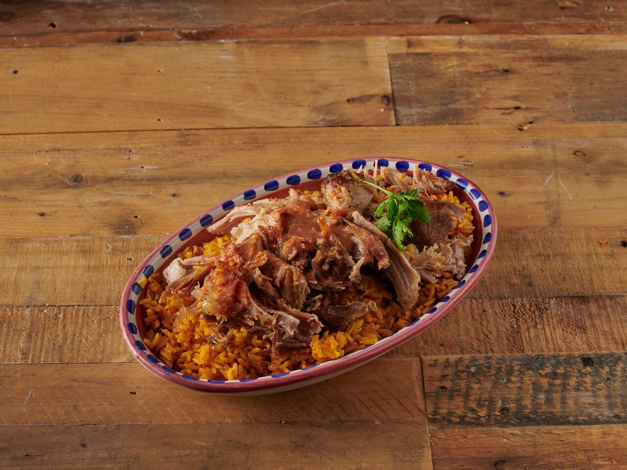 Order Rice with Roast Pork food online from Sazon Nunez store, Brooklyn on bringmethat.com