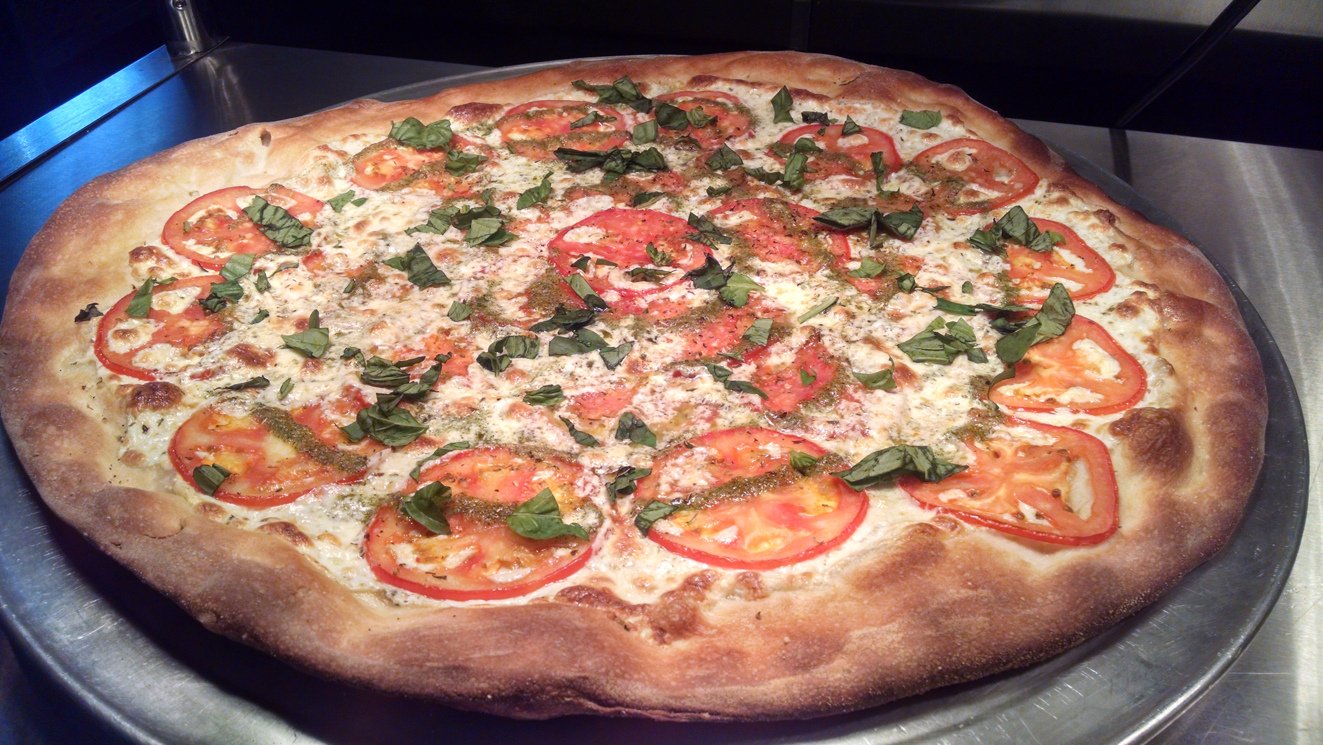 Order Classic Margherita Pizza food online from Rocky's Pizza store, Huntersville on bringmethat.com