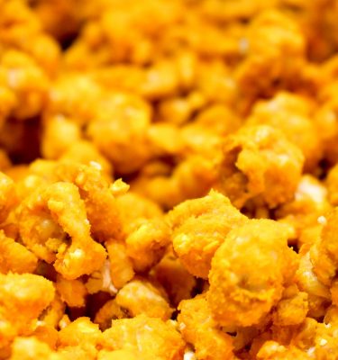 Order Cheese Coated Caramel Popcorn food online from Chicagoland Popcorn store, Merrillville on bringmethat.com