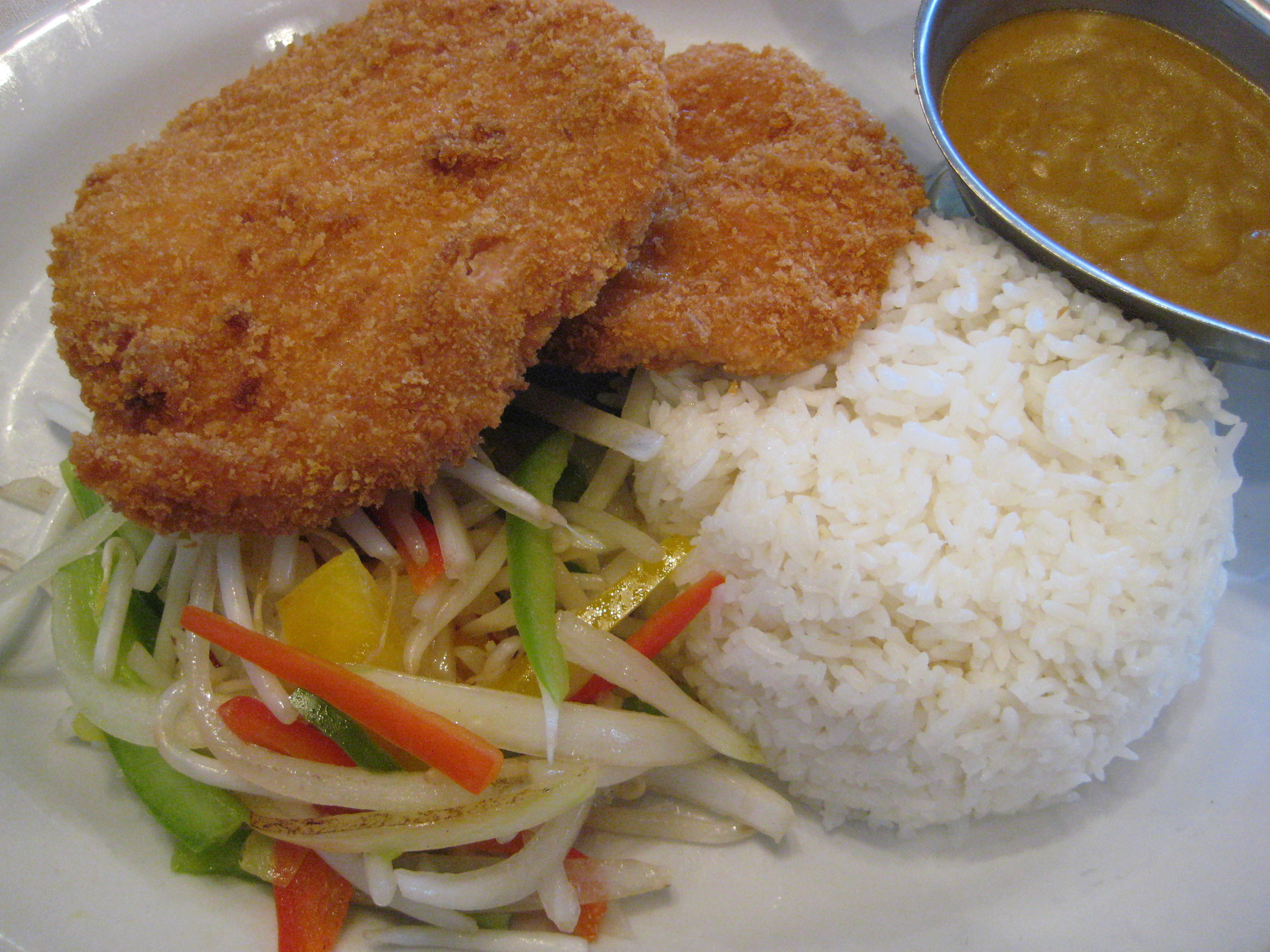 Order Curry Pork Chop Cutlet 咖哩吉烈豬扒 food online from Street Food Cafe store, San Mateo on bringmethat.com