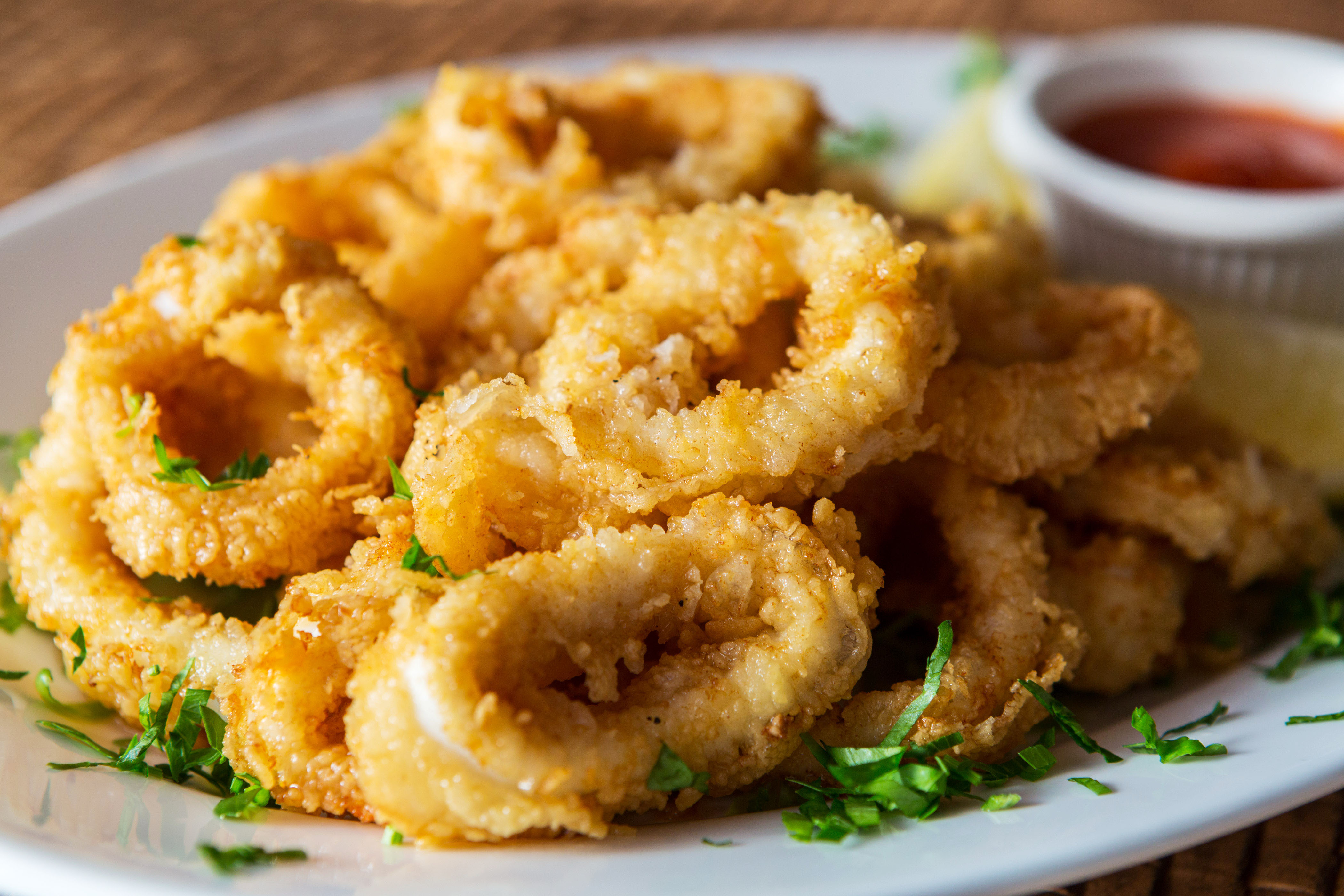 Order Fried Calamari food online from Fasil Mediterranean Restaurant store, Boonton on bringmethat.com