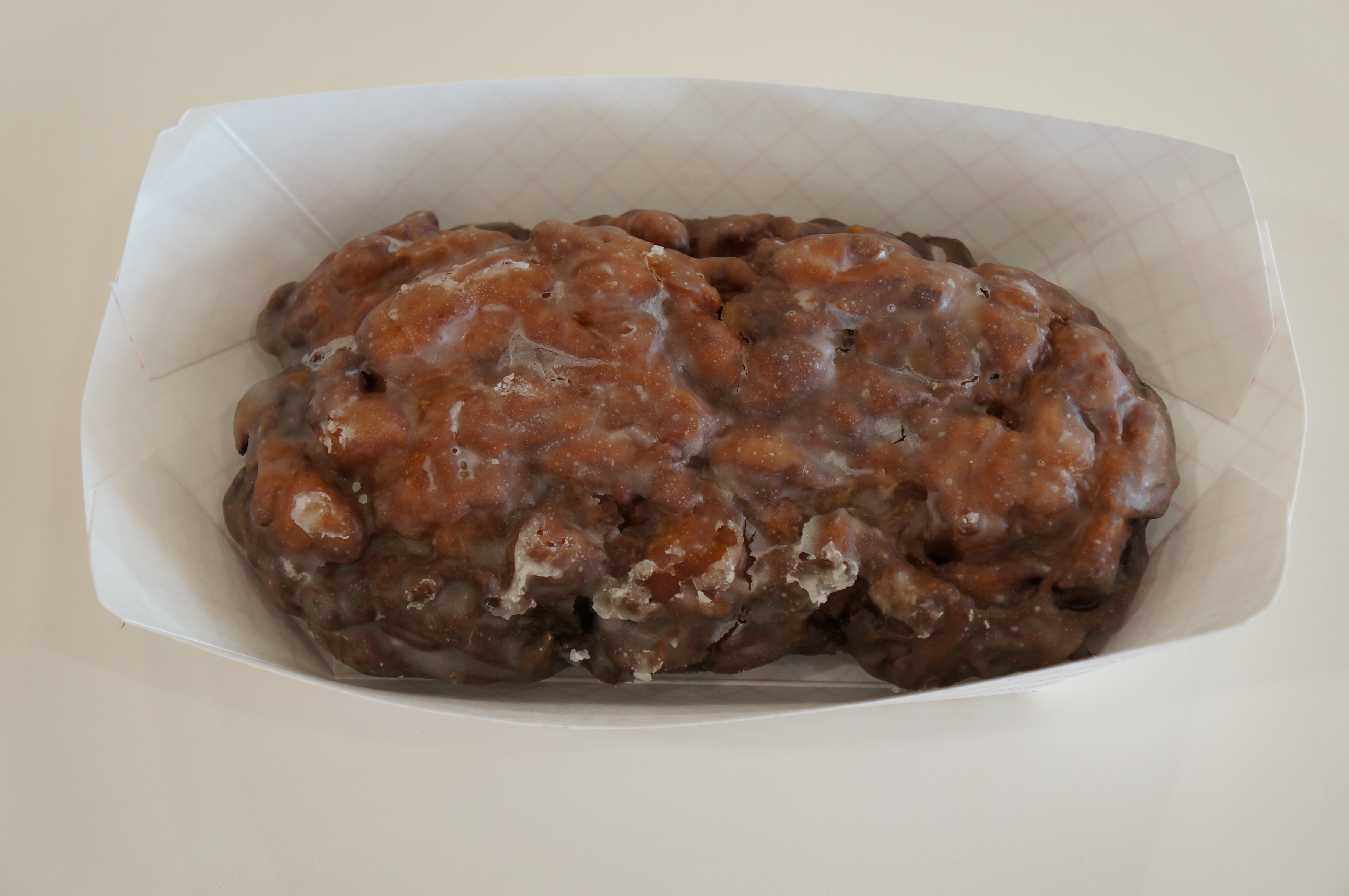 Order Apple Fritter food online from Shipley Do-Nuts store, Houston on bringmethat.com