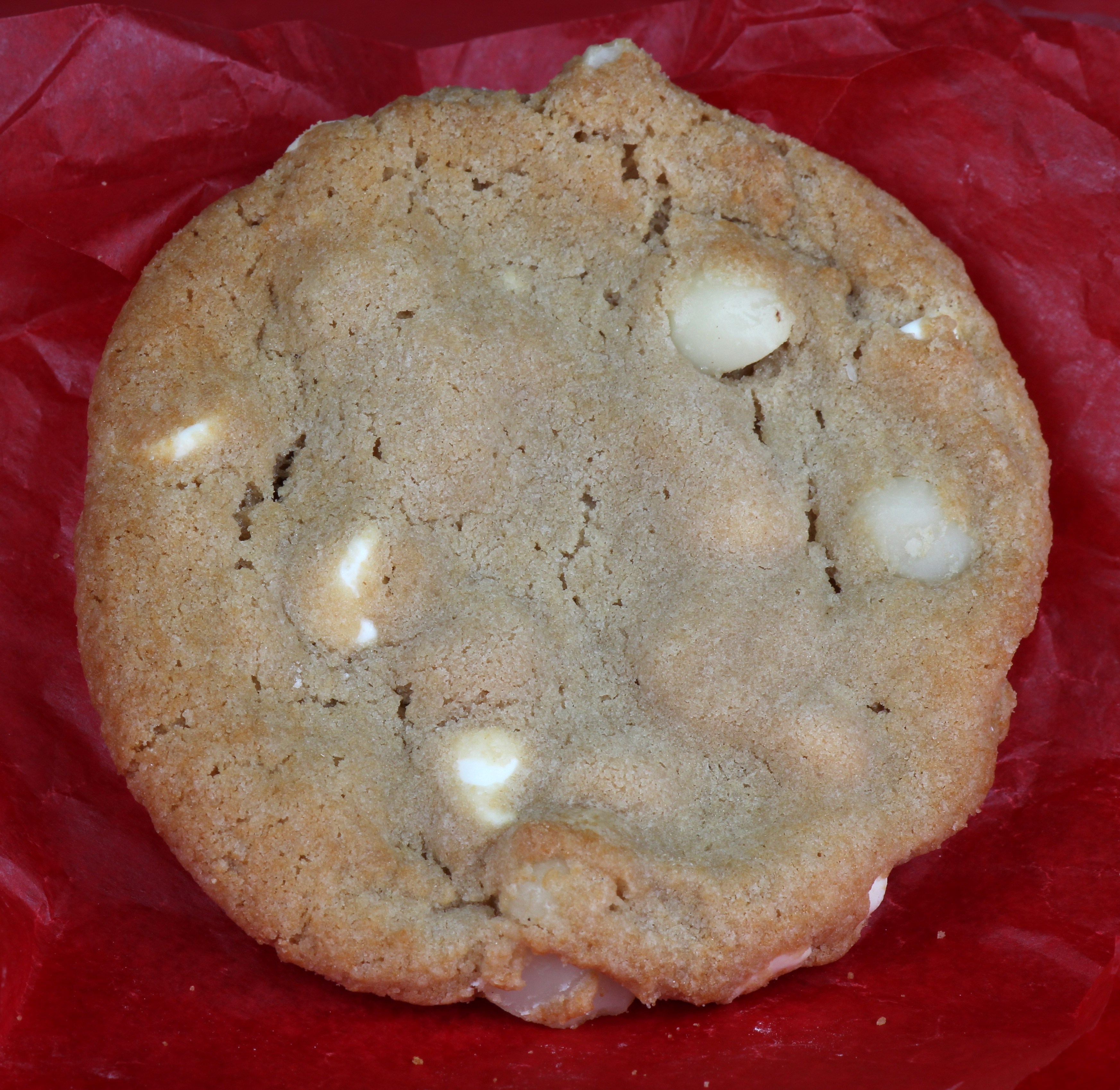 Order Macadamia White Chip Cookie food online from The Cookie Company store, Omaha on bringmethat.com