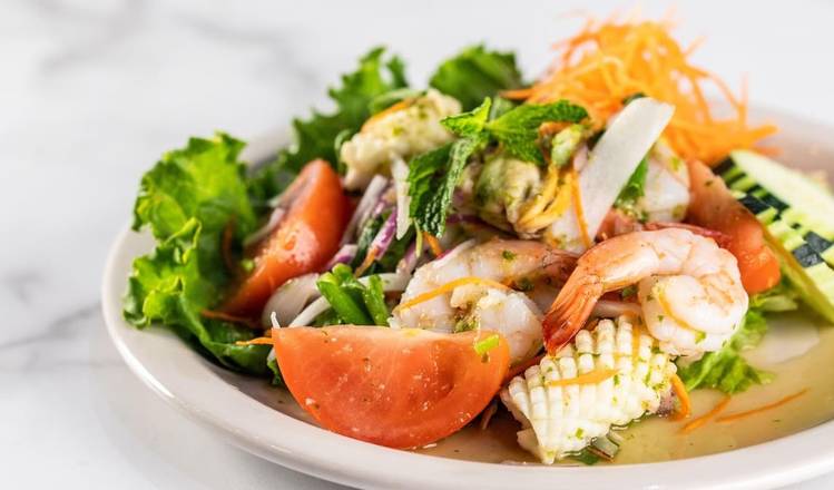 Order Calamari Salad food online from Zato Thai Cuisine & Sushi Bar store, Dallas on bringmethat.com