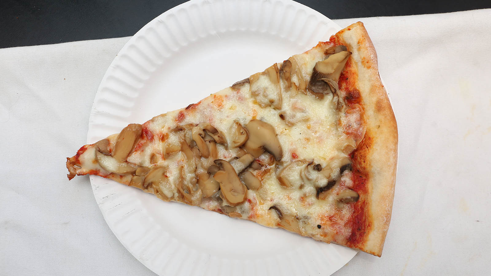 Order Mushroom Slice food online from Joey Pepperoni's Pizza store, Bronx on bringmethat.com